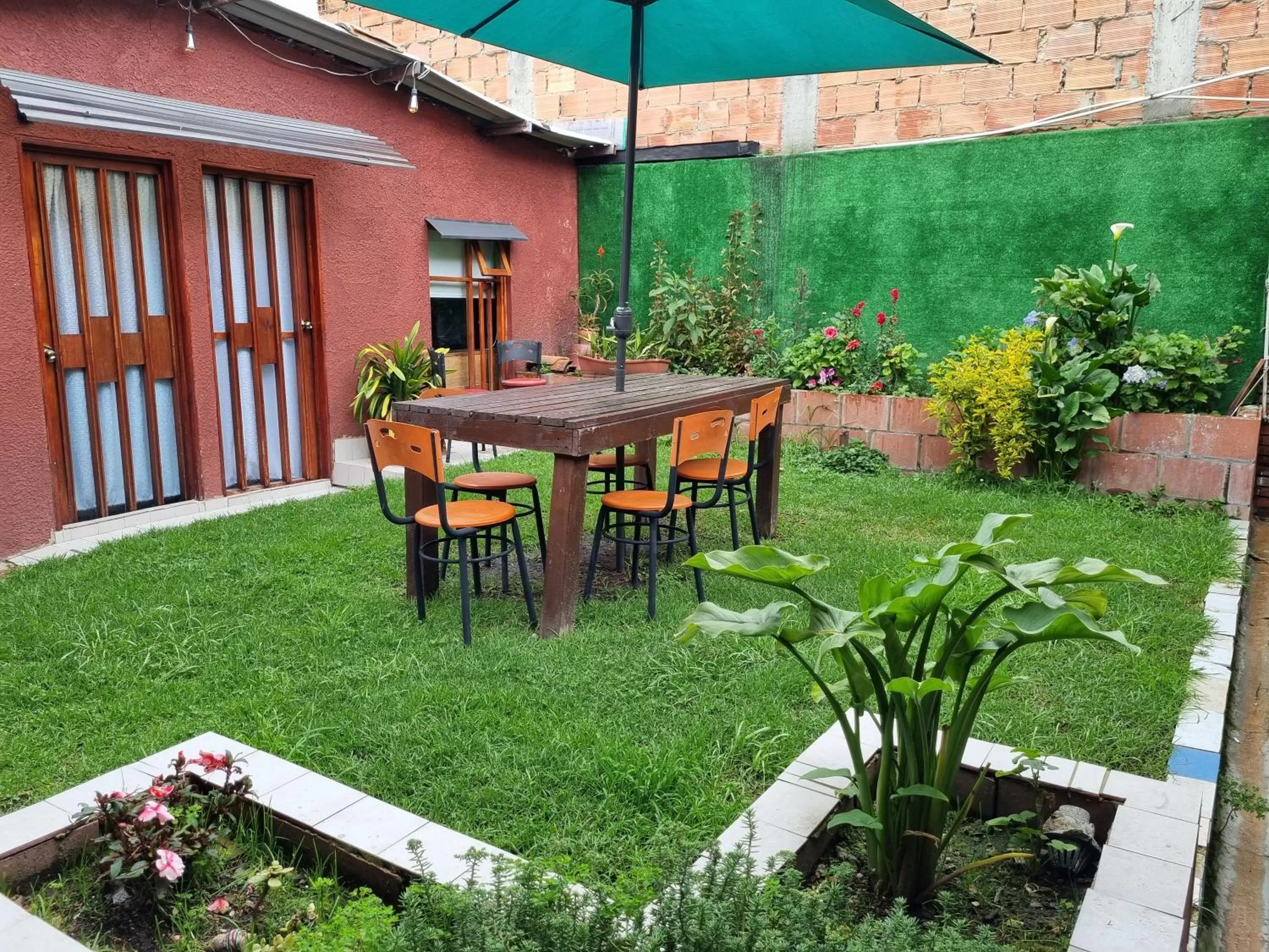 Garden in acogedor Hostal usaquen la parada del tren