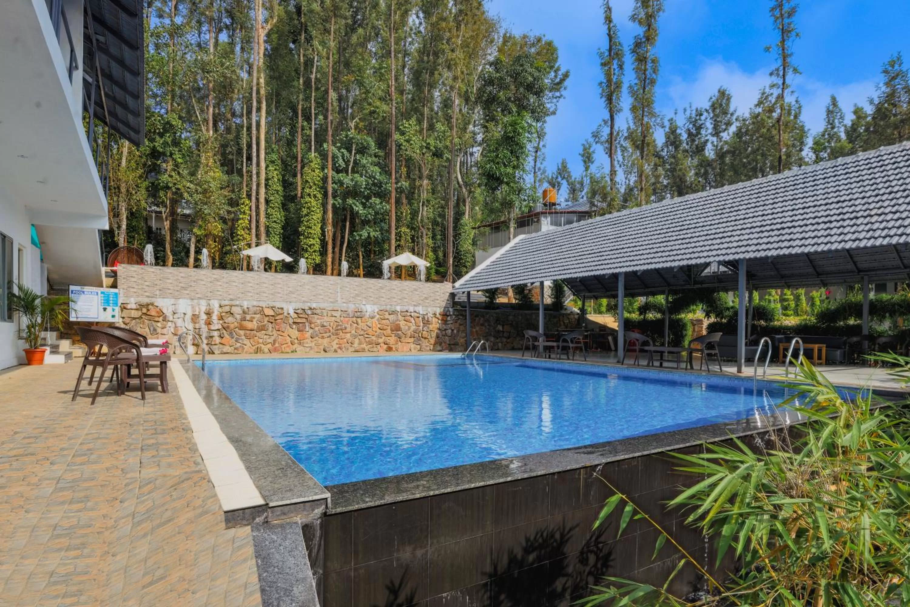 Swimming pool in The Spectrum Resort - Chikmagalur