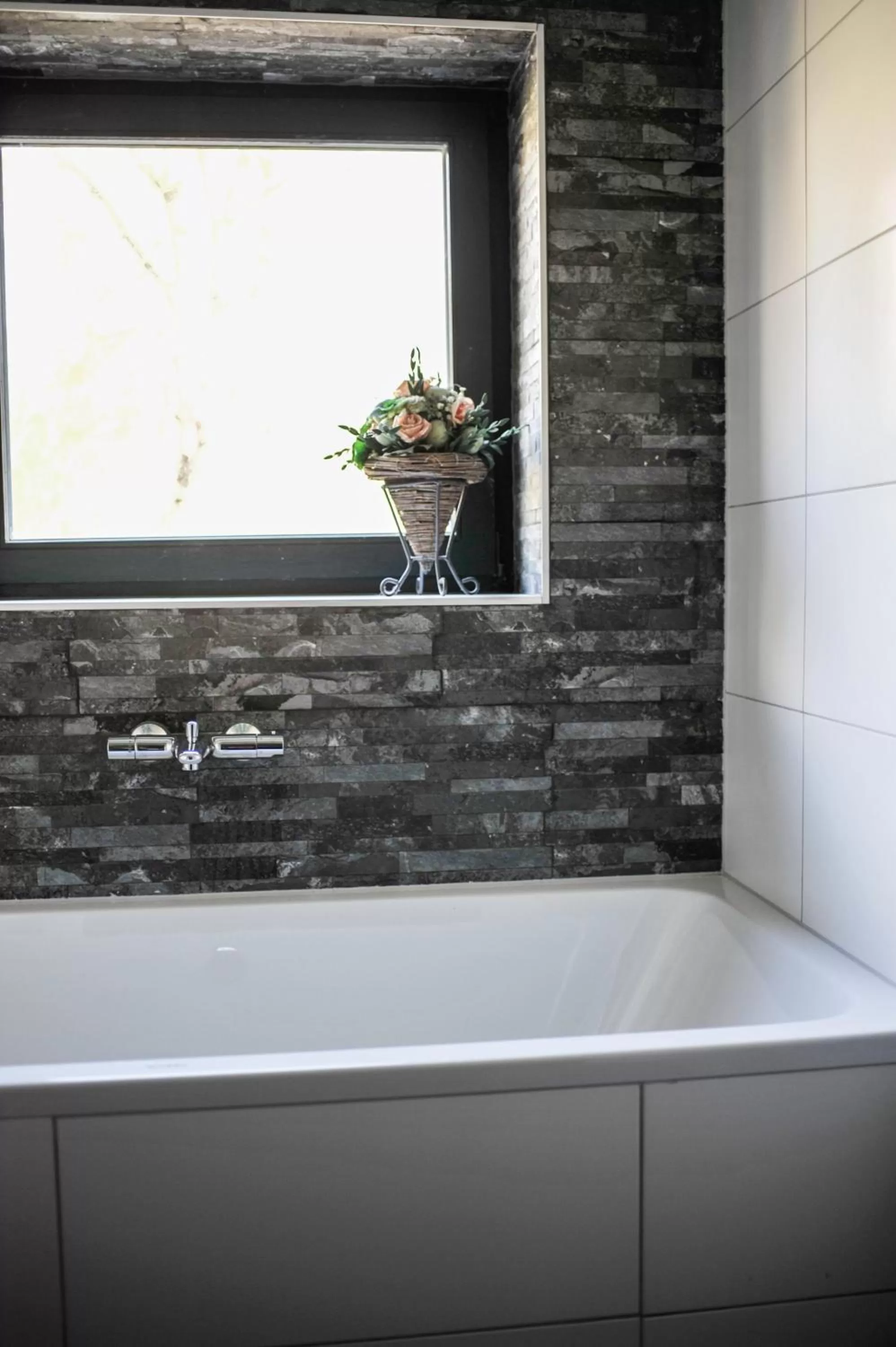 Bathroom in B&B De Dubbelmolen