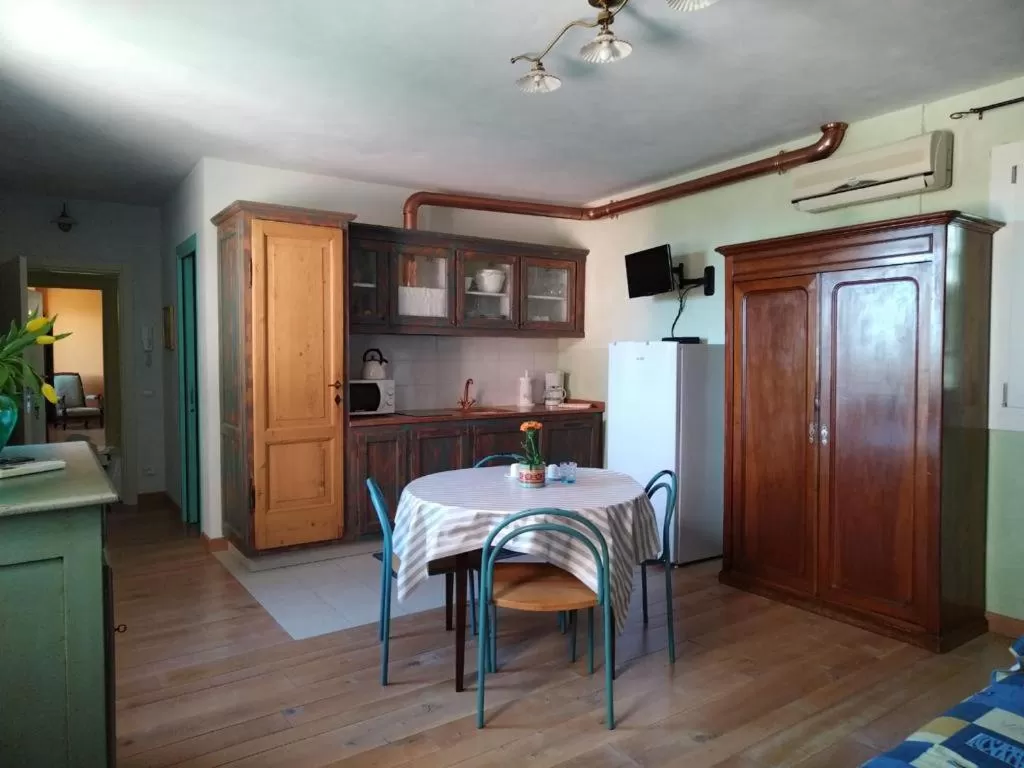 Kitchen/Kitchenette in Borgo al Sole by Garda Facilities