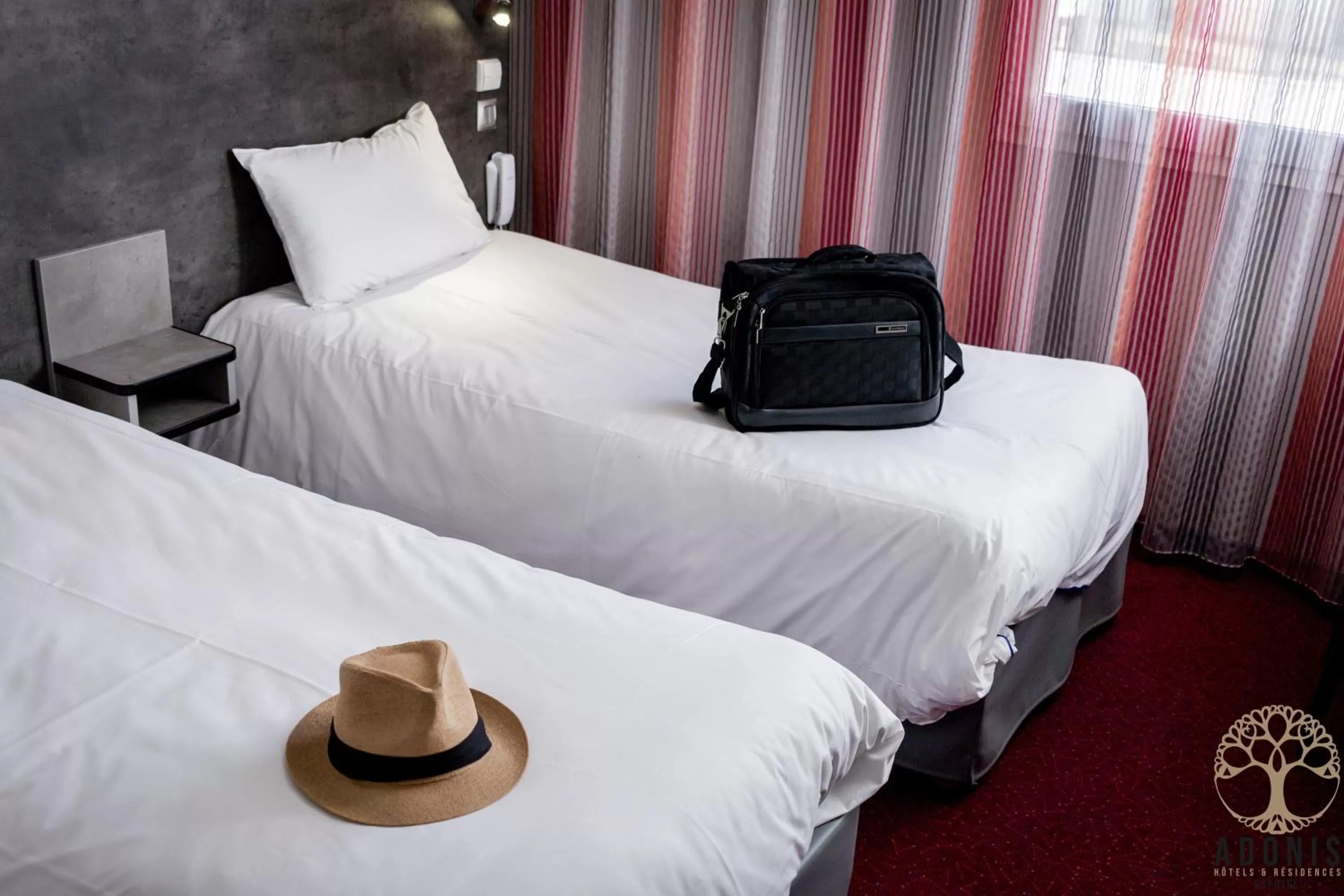 Bed in Adonis Gapotel