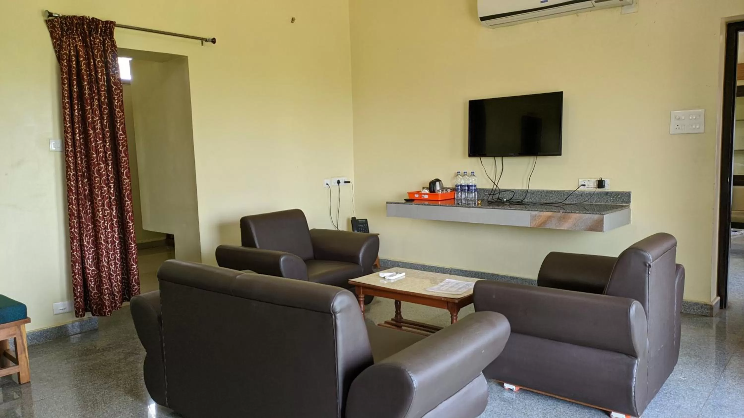 Seating area in Kanthi Resorts Badami