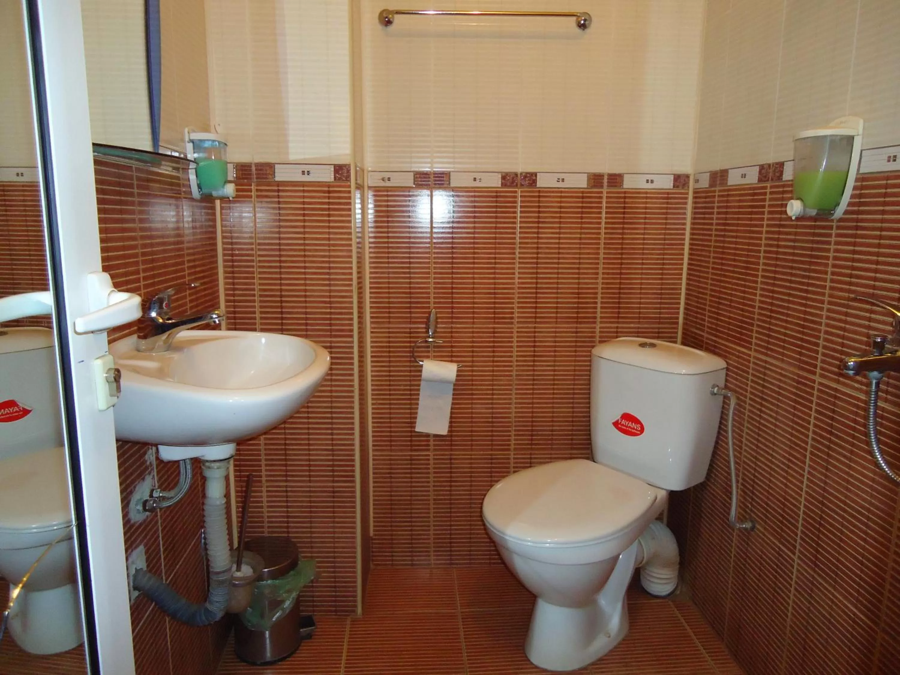 Bathroom in Dionis Hotel