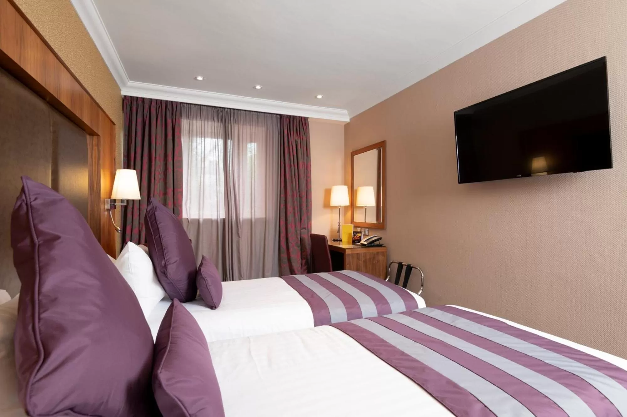 Bed in Donnington Manor Hotel