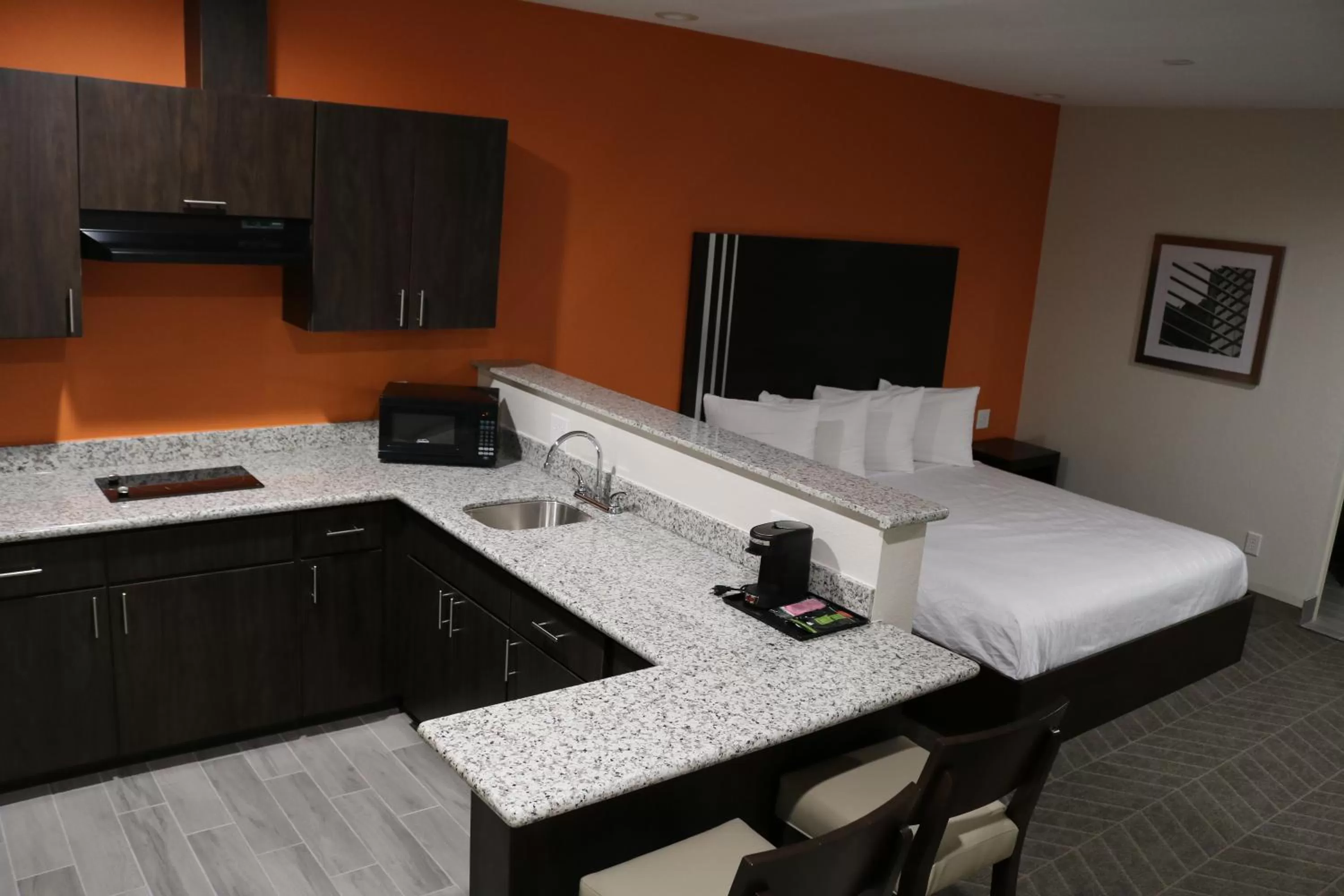 Kitchen or kitchenette in Scottish Inn & Suites - IAH Airport