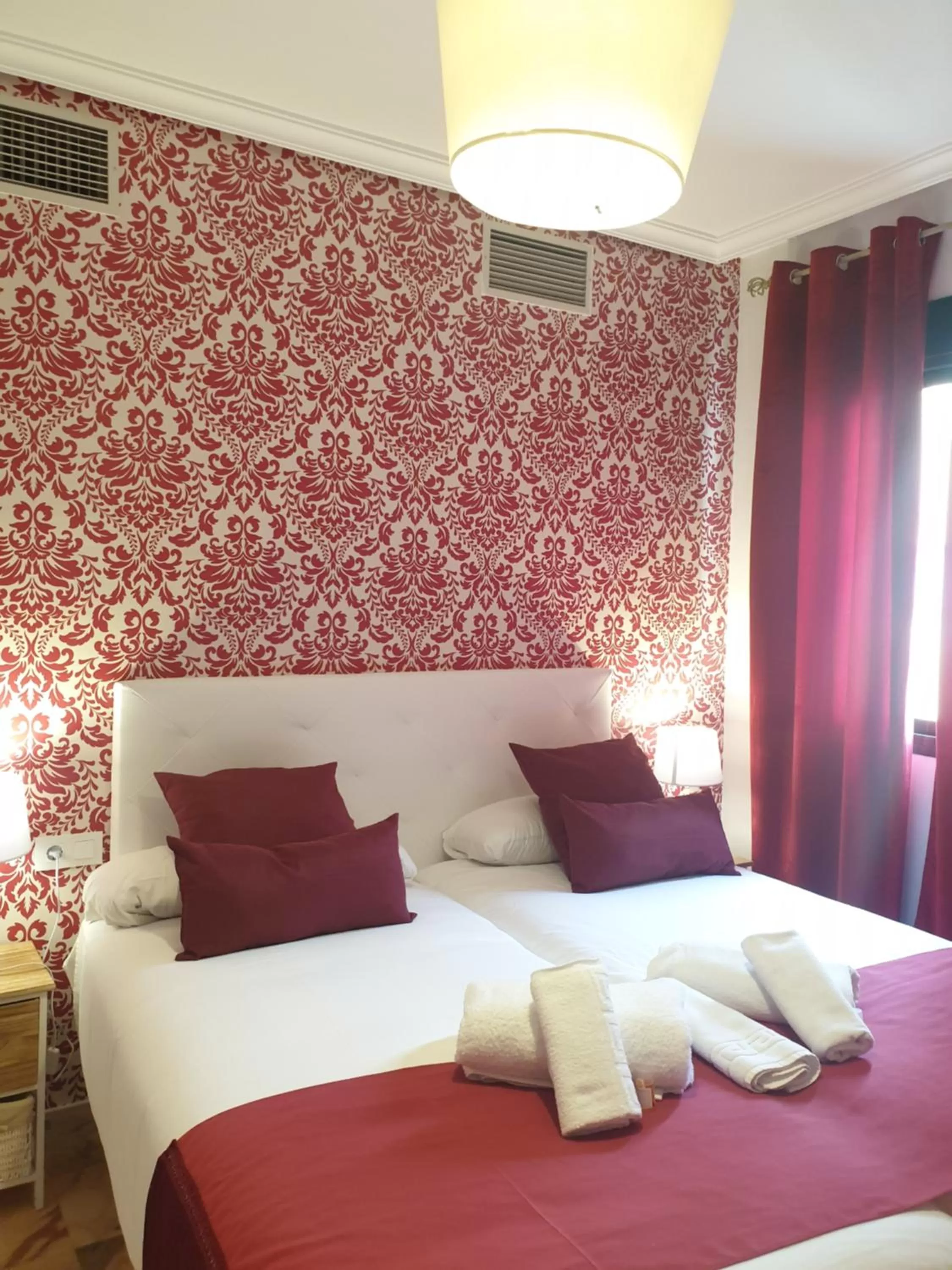 Bed in Hotel y Apartamentos Doña Lola