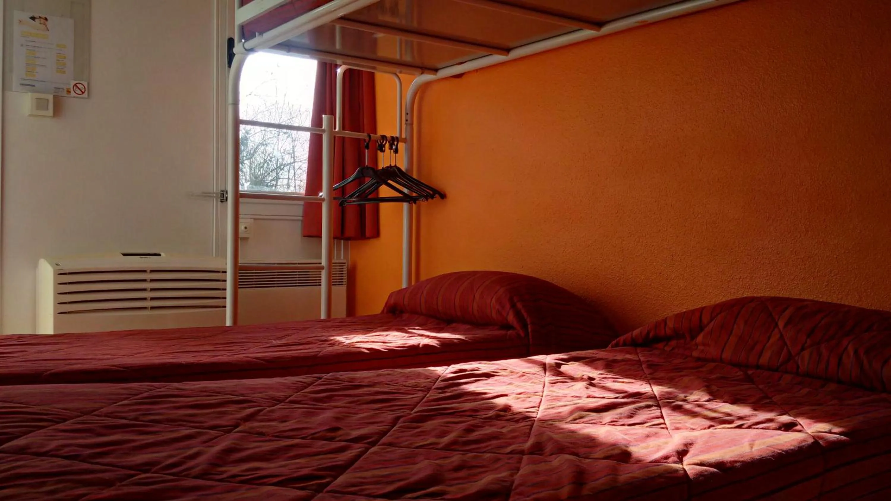 Bedroom, Bed in Premiere Classe Grenoble Nord Moirans