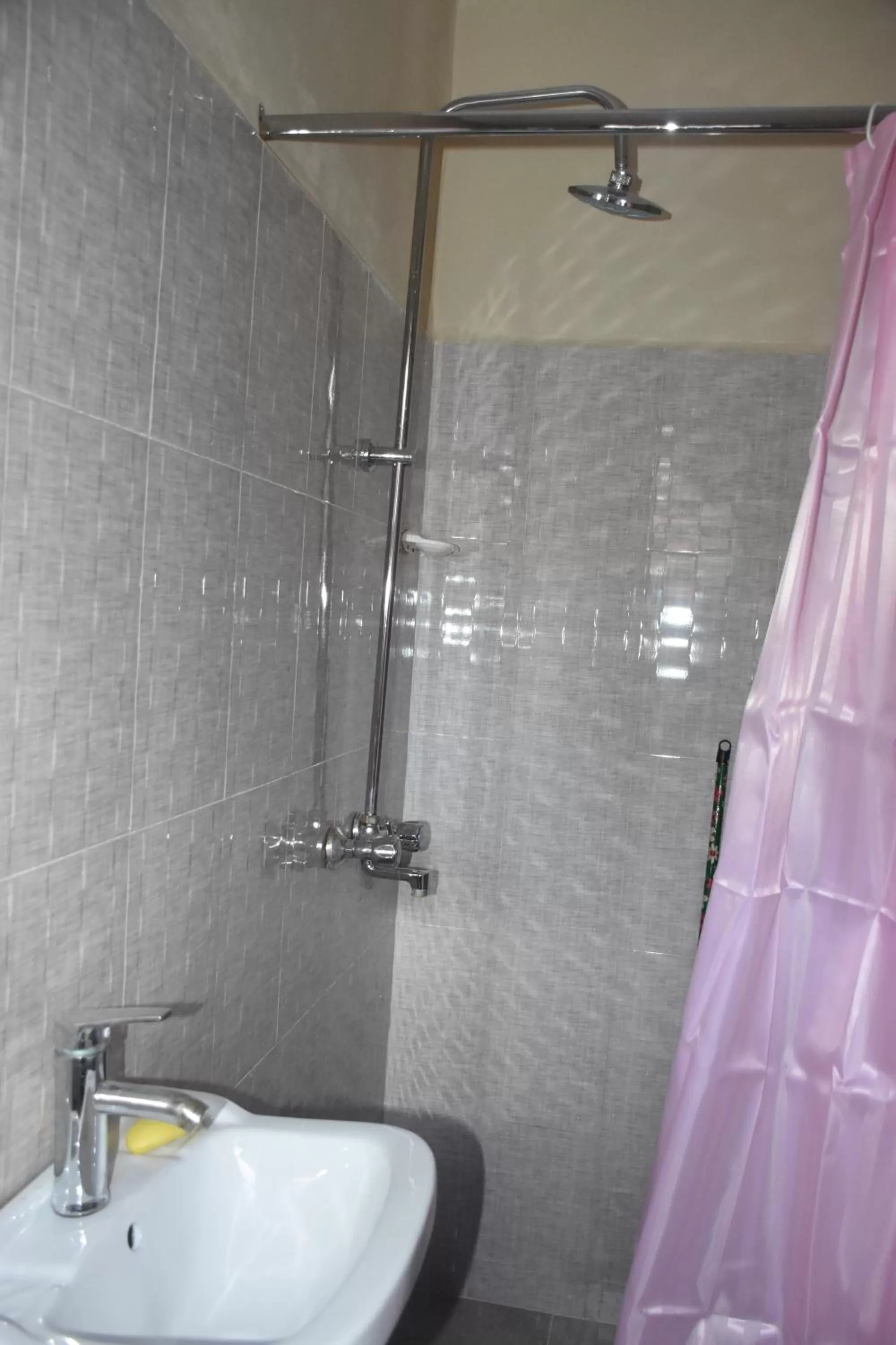 Shower in L&J Modern Backpackers Kinondoni