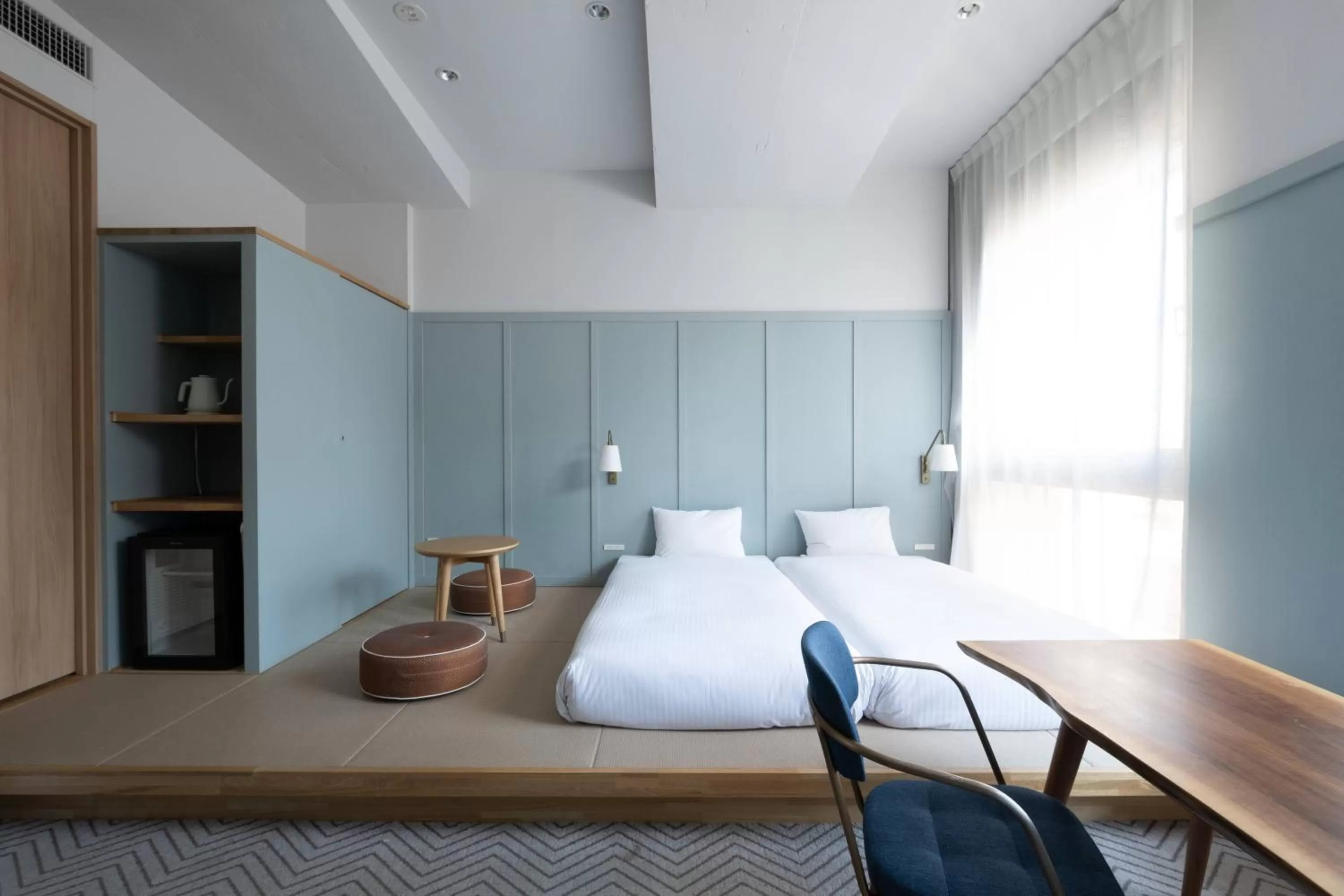 Photo of the whole room, Bed in RAKURO Kyoto by THE SHARE HOTELS