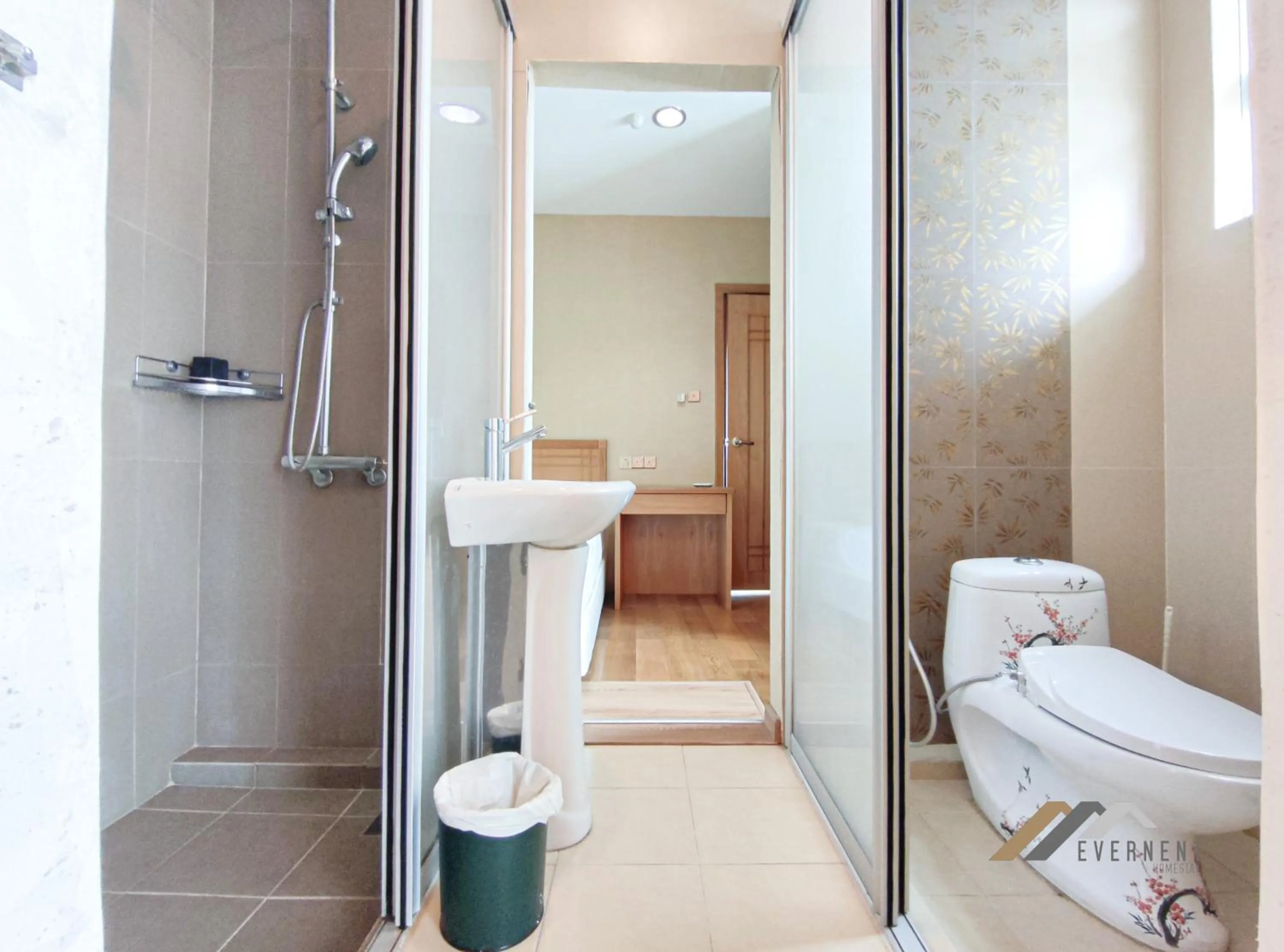 Bathroom in Mciti Suites by Evernent