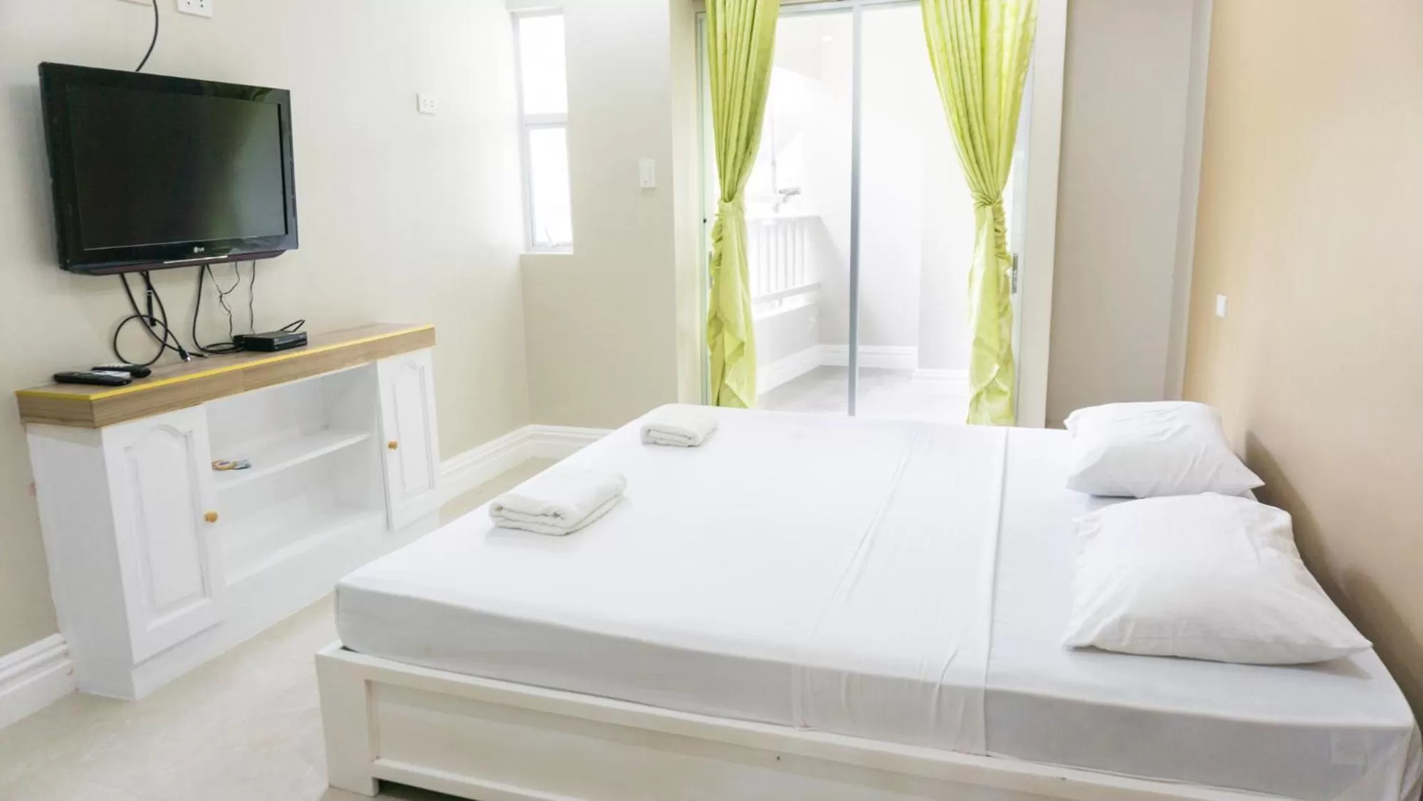 Bed in Sandscape Hotel