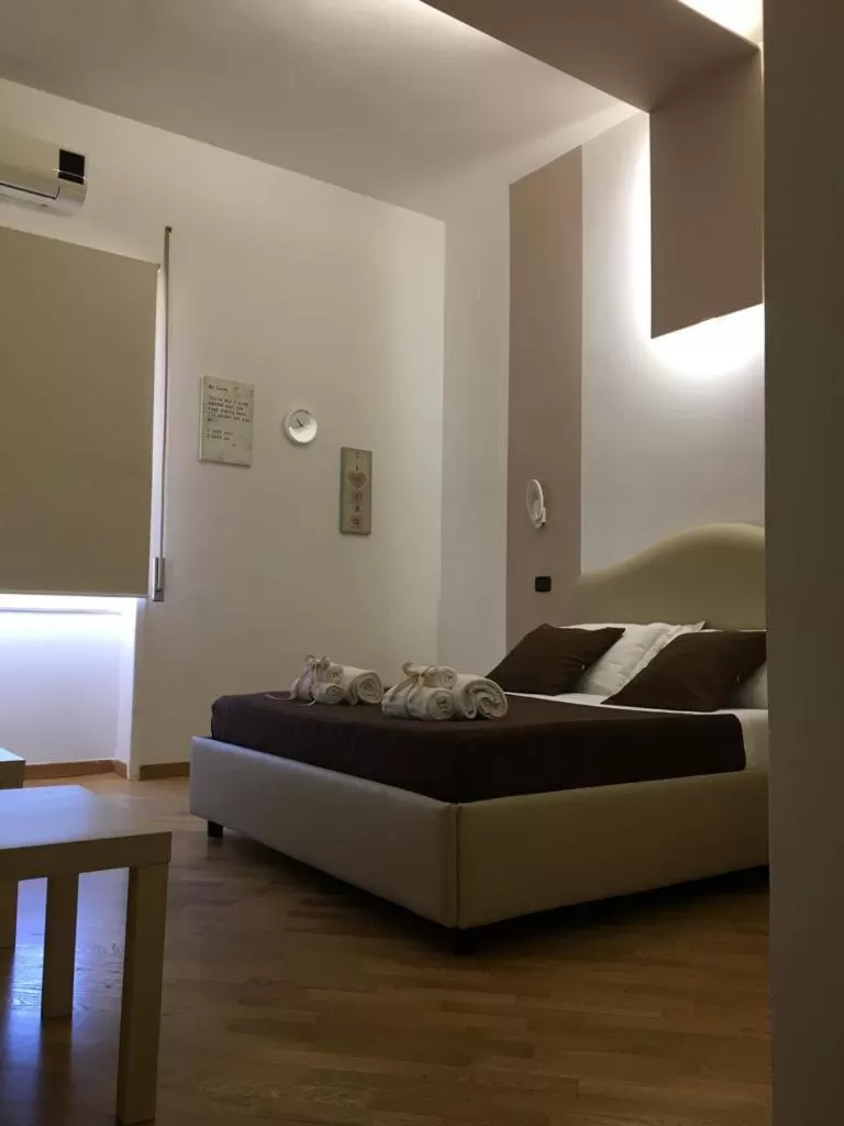 Bed in Maison Arena Bovio