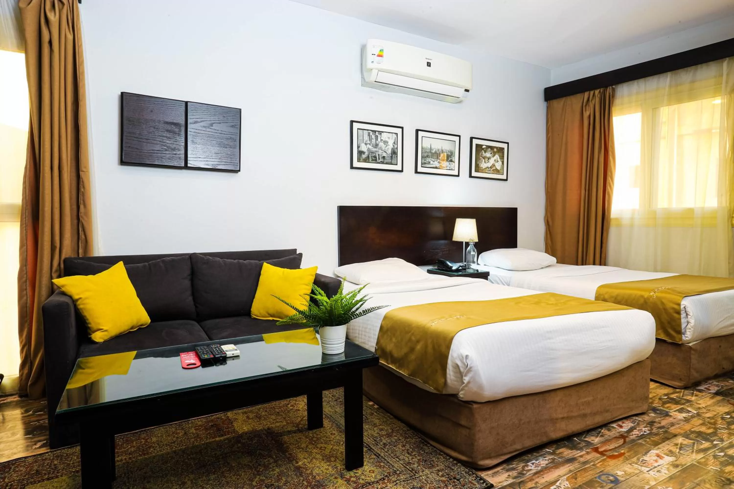 Bed in NewCity Hotel & Suites