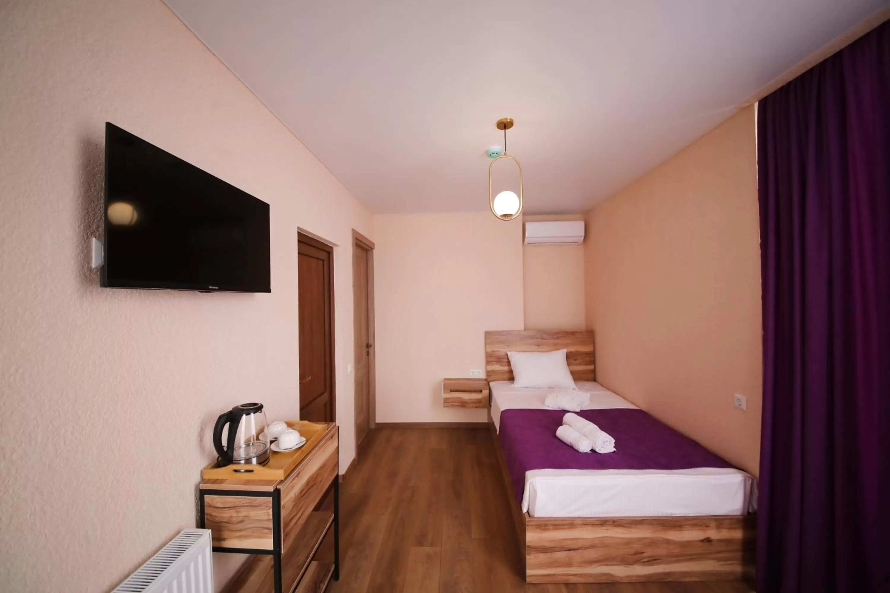 Bed in Bessarion Boutique Hotel