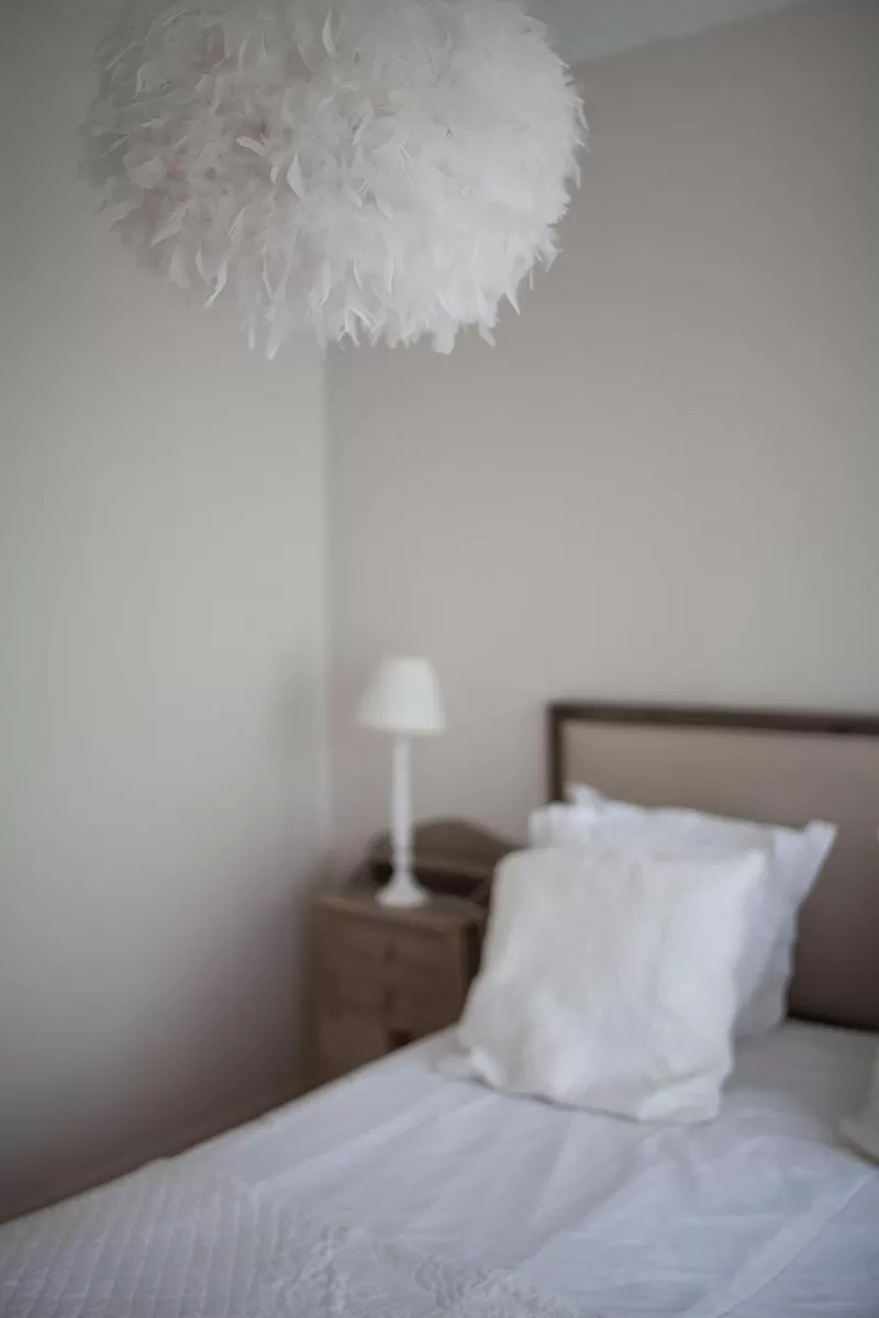 Bed in Bienvenue Chez Nous