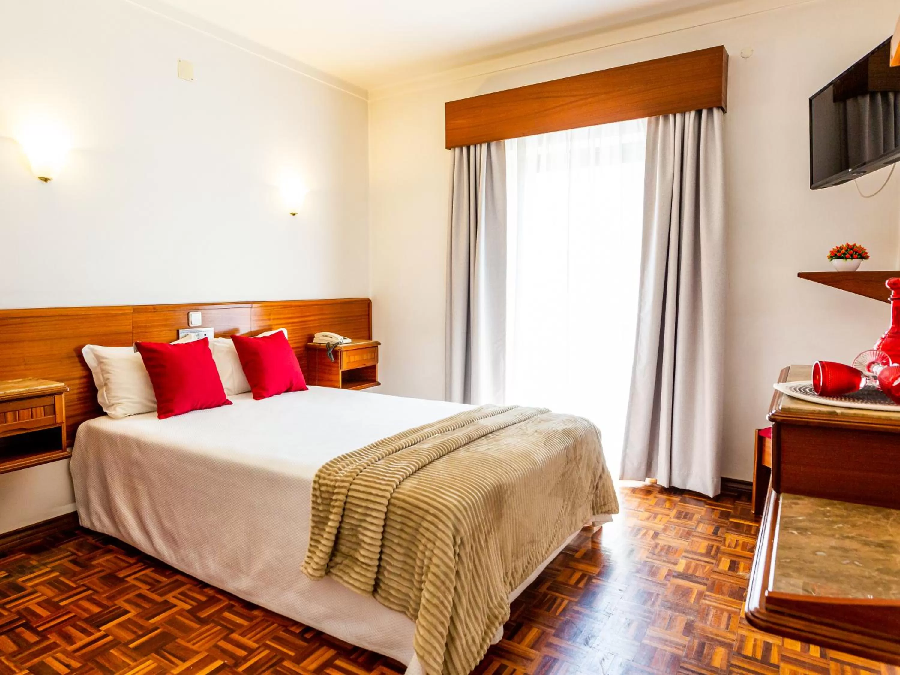 Bed in Dona Amélia Hotel by RIDAN Hotels