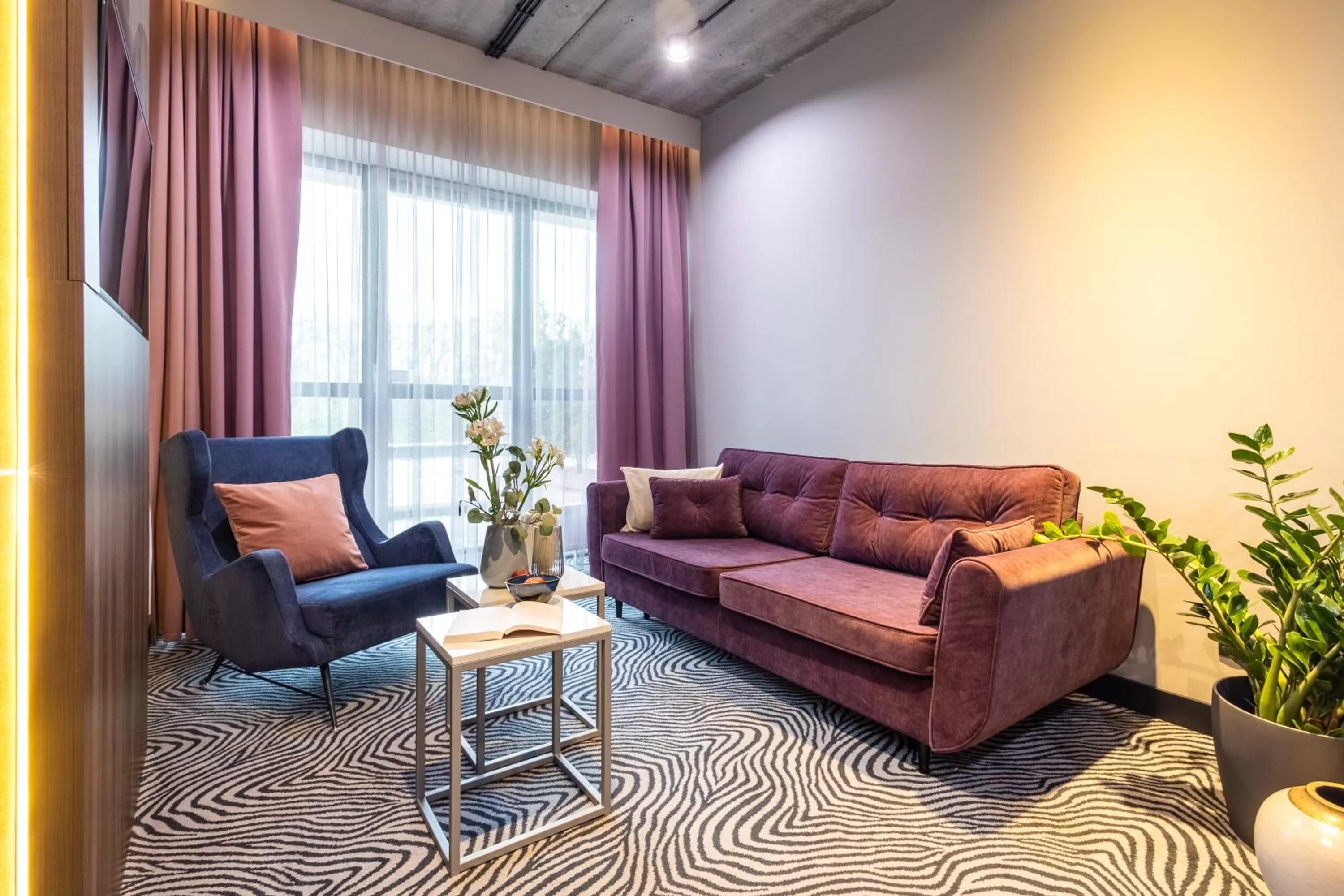 Living room in Hotel Zoo by Afrykarium Wroclaw