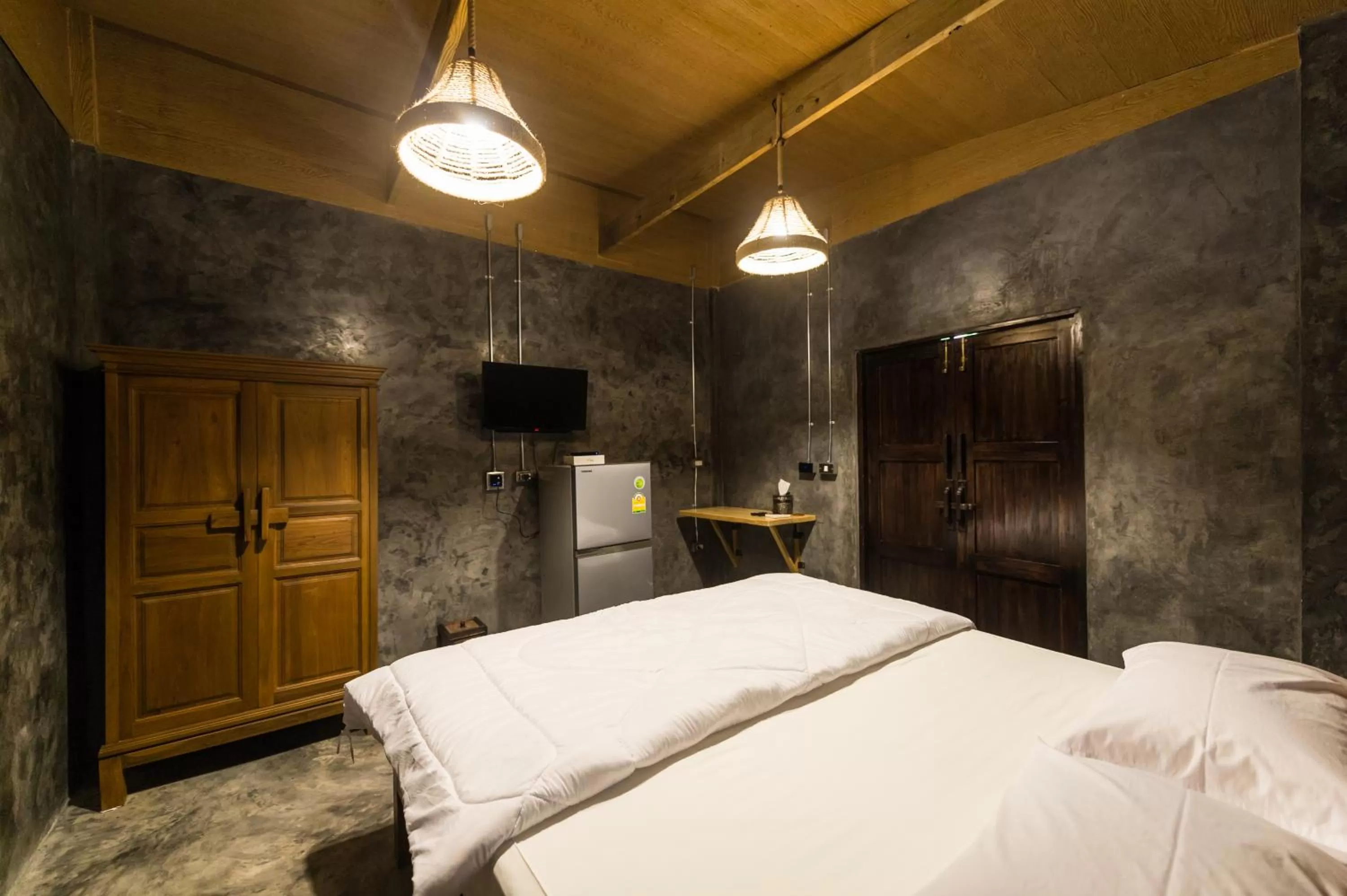 Photo of the whole room, Bed in Huan Amphan