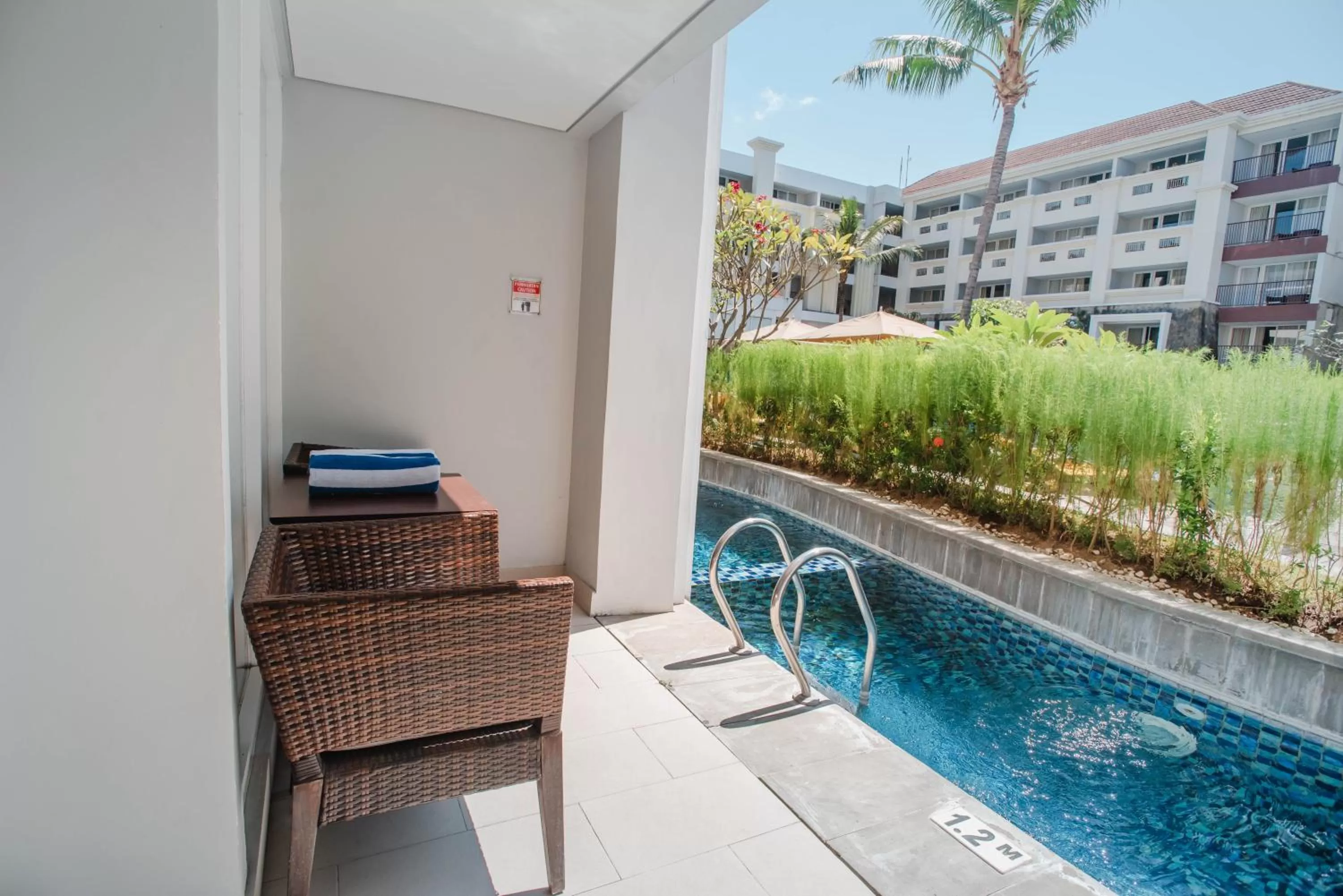 Swimming Pool in Swiss-Belresort Watu Jimbar