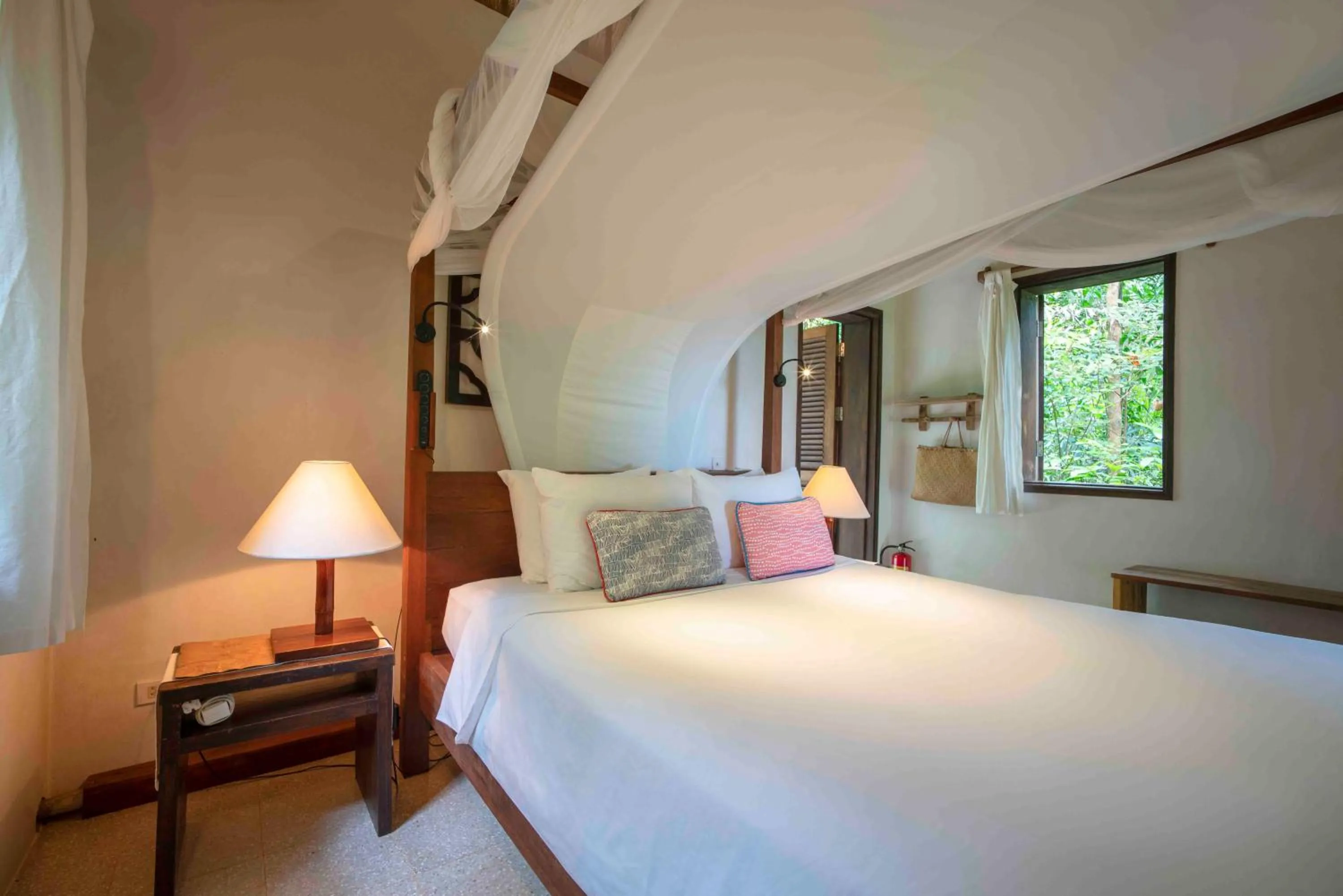 Bed in Mango Bay Resort