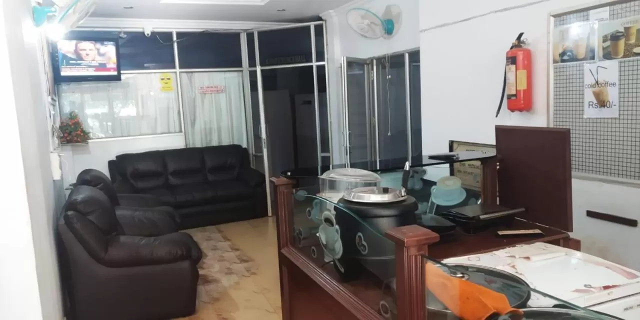 Lobby or reception in Anandan Tourist Home