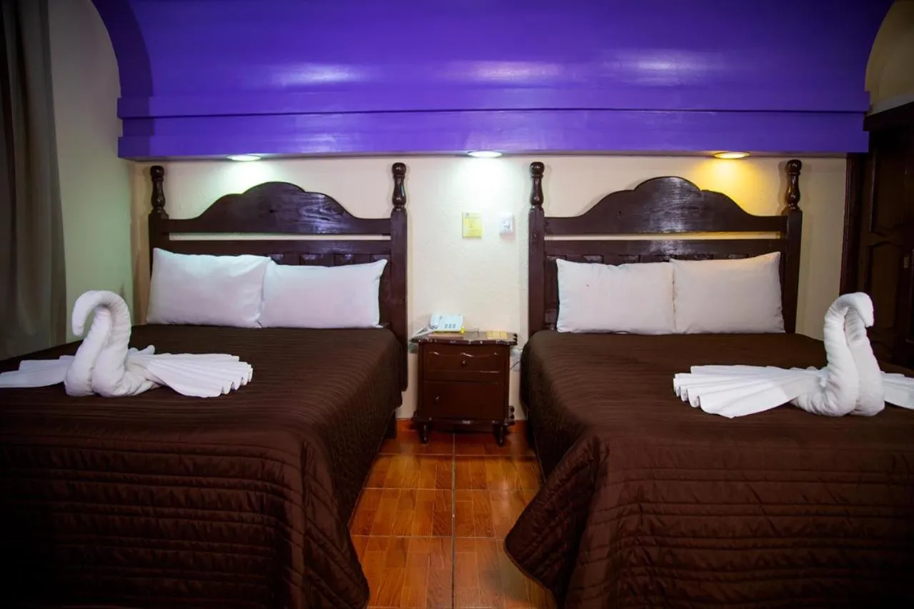 Bed in Hotel D’Monica