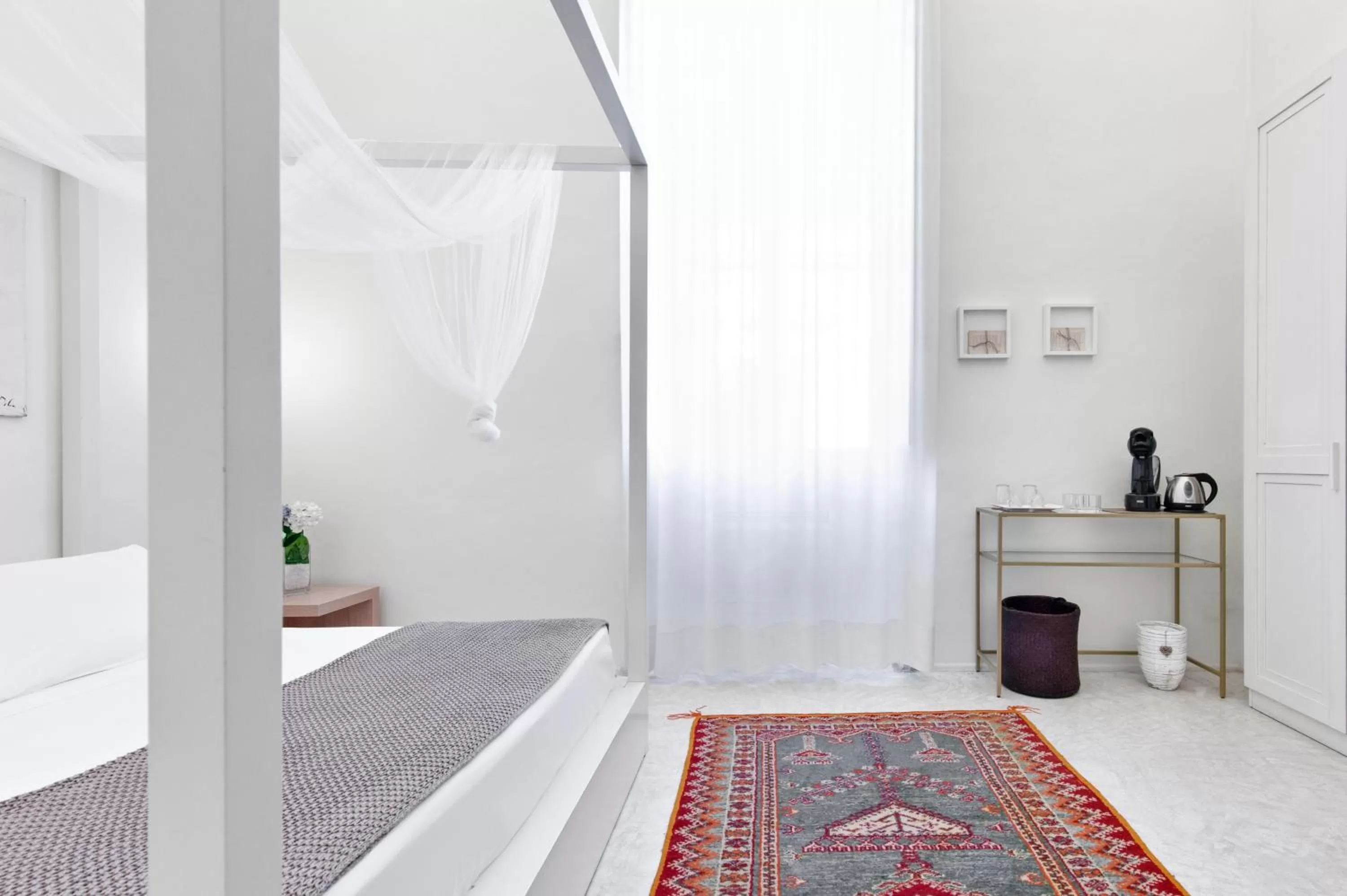 Bed in Casa di Lo Suites