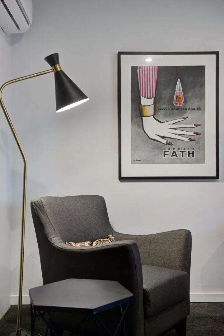 Seating area in CBD Motor Inn