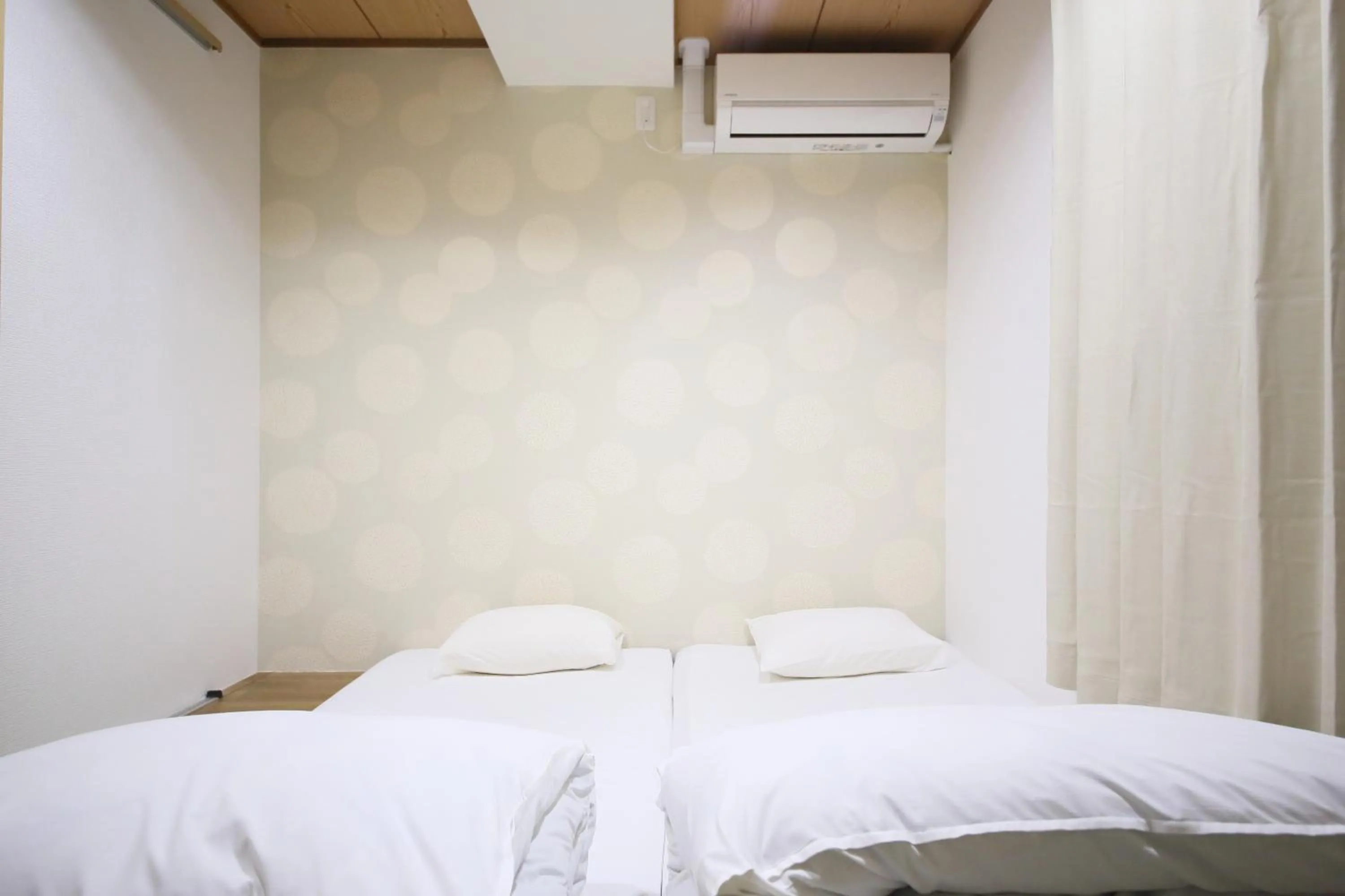 Bed in Hotel Shin-Imamiya