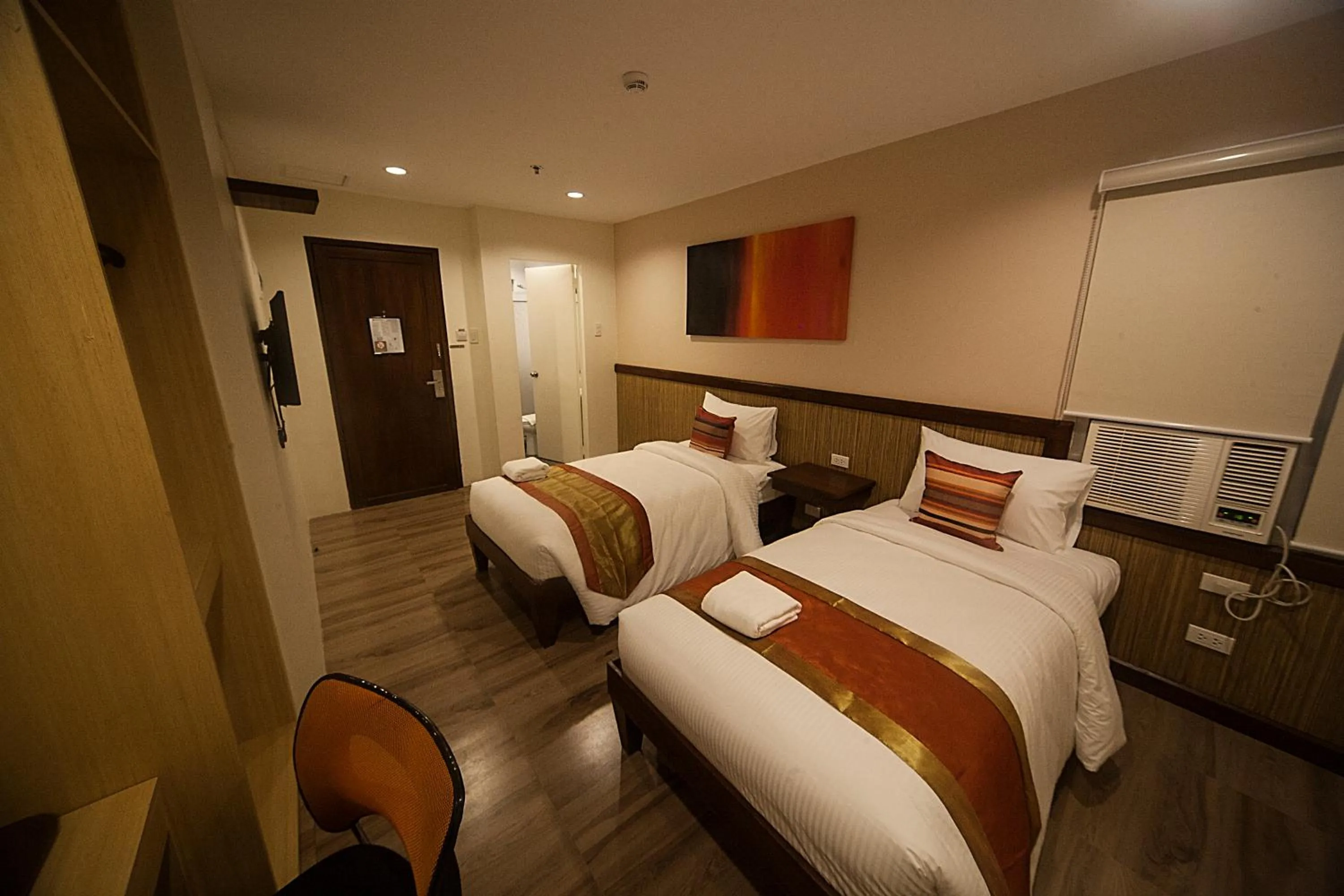 Bed in NS Royal Hotel