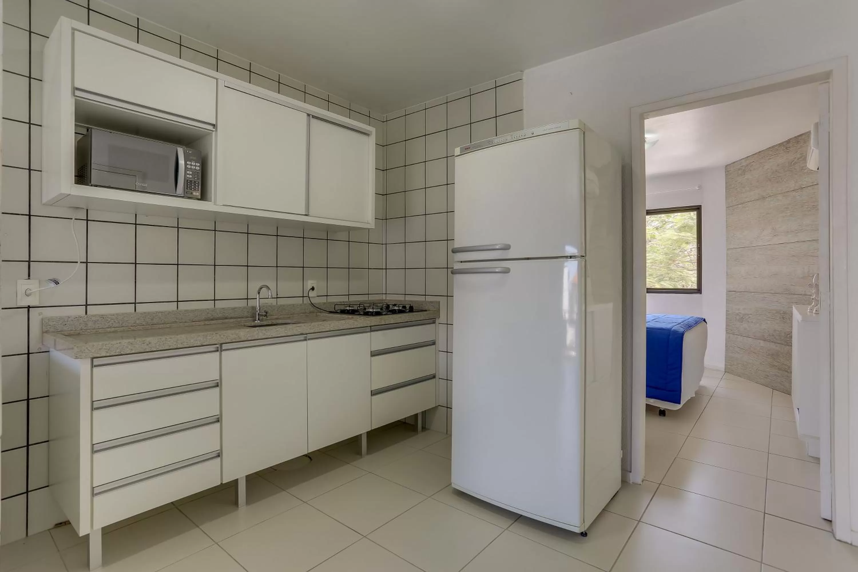 Kitchen or kitchenette in Pousada Saint Paul