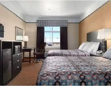 Photo of the whole room in Super 8 by Wyndham Odessa TX