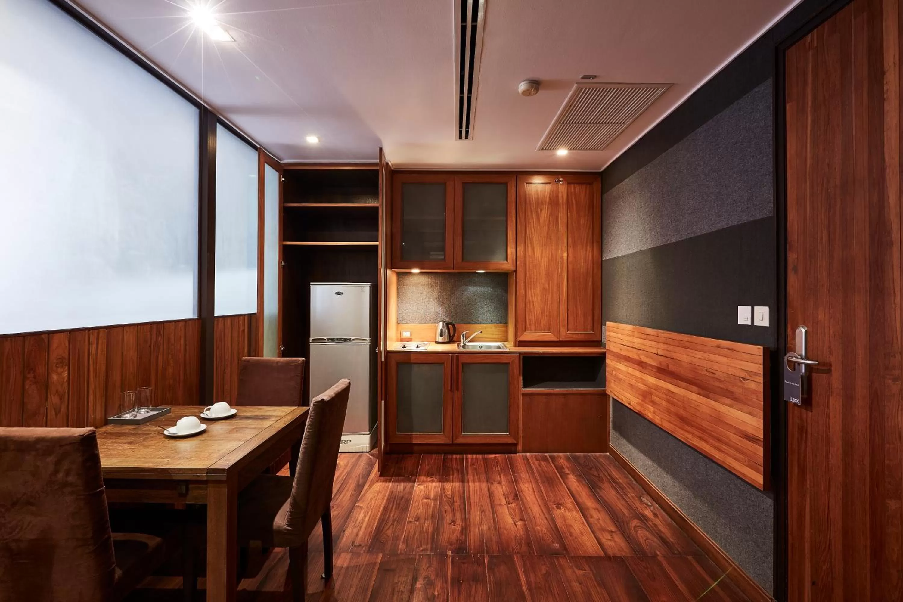 Kitchen or kitchenette in LUXX Langsuan Hotel - SHA Plus