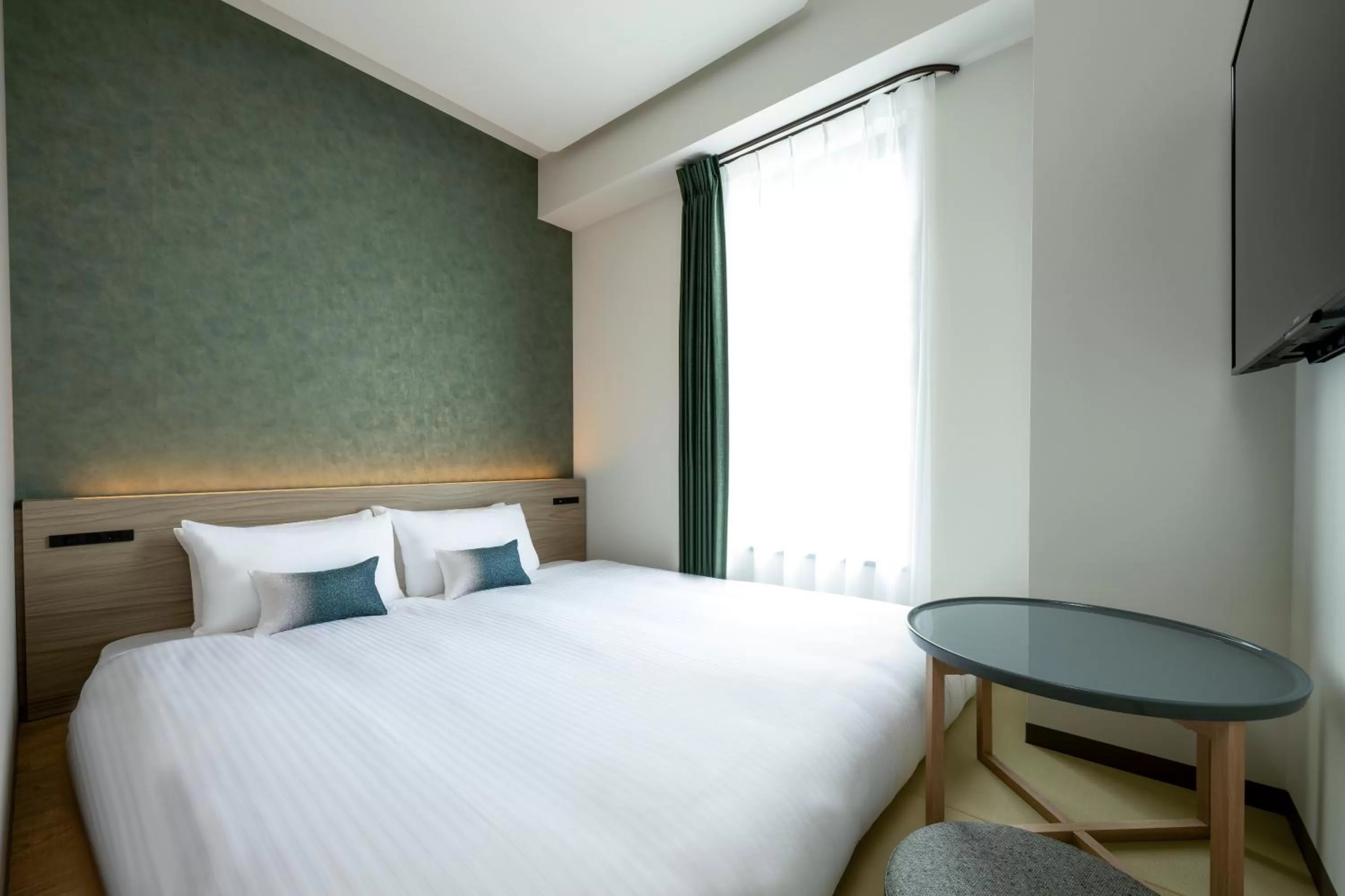 Photo of the whole room, Bed in HOTEL AMANEK Shinjuku Kabukicho