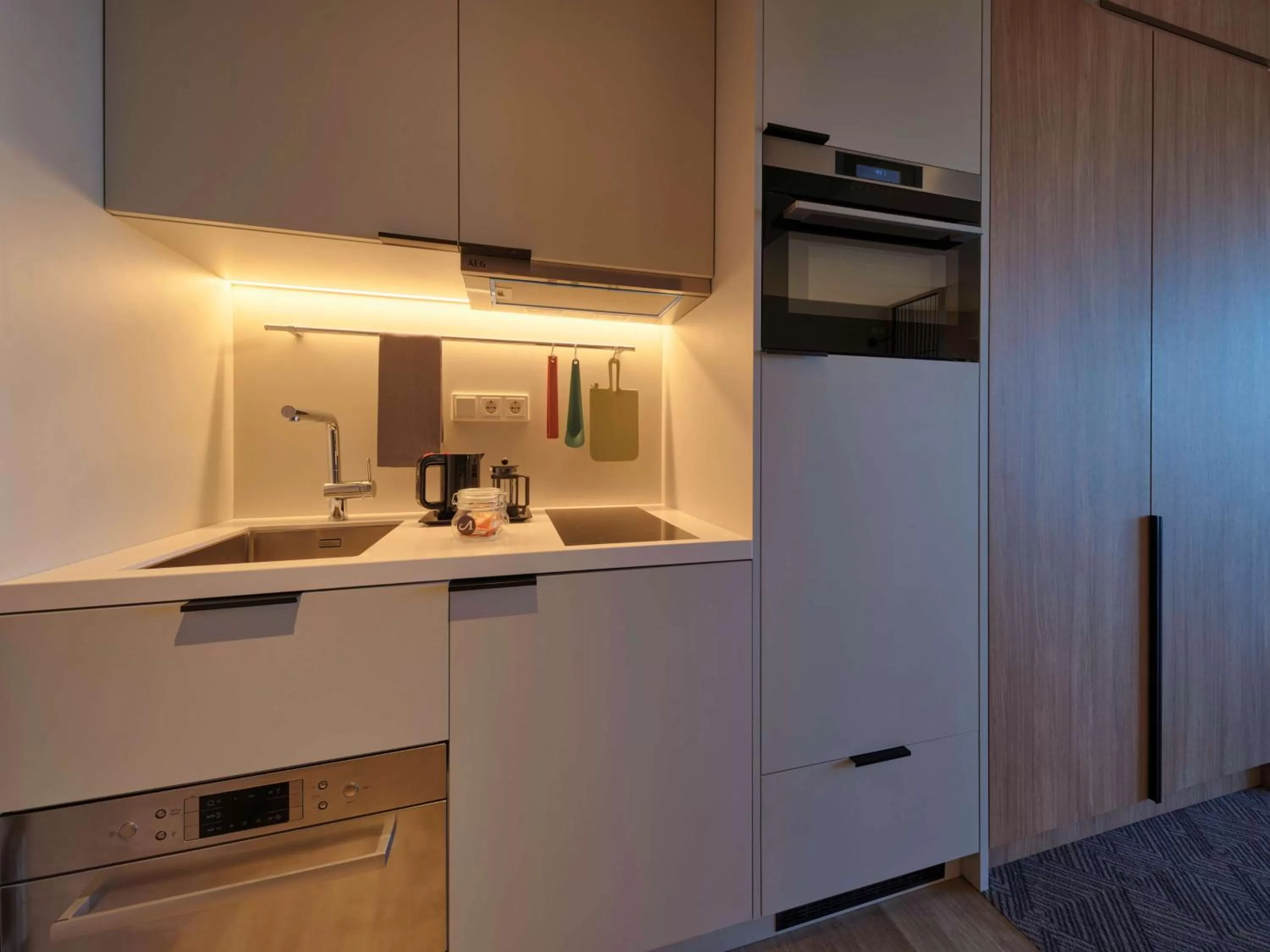 Kitchen or kitchenette in Adina Apartment Hotel Munich