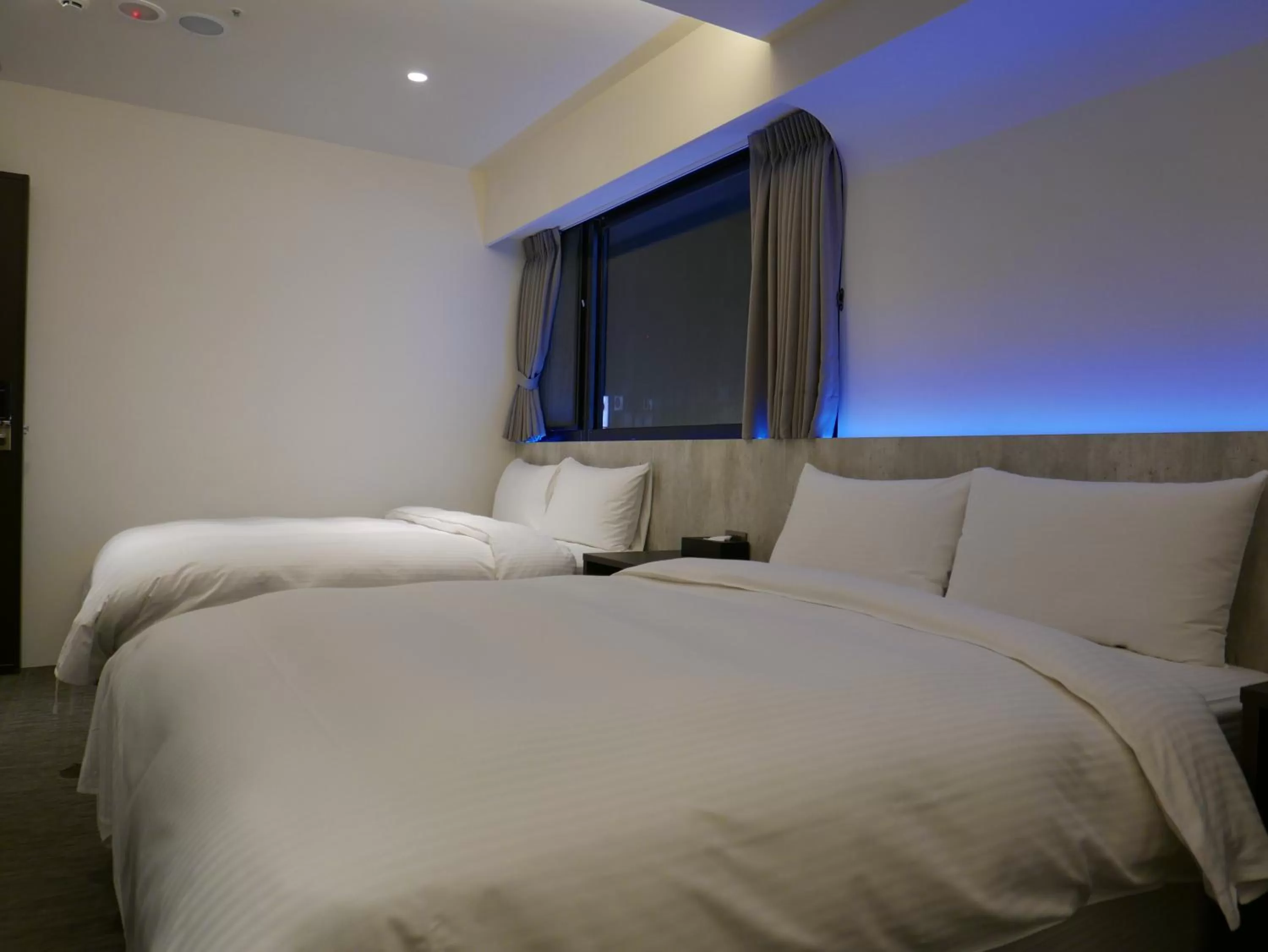 Bed in 泊居旅店二館 Oursinn Hotel 2