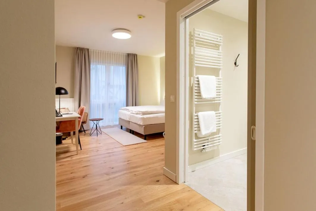 Bedroom, Bed in Hotel Tuchhaus