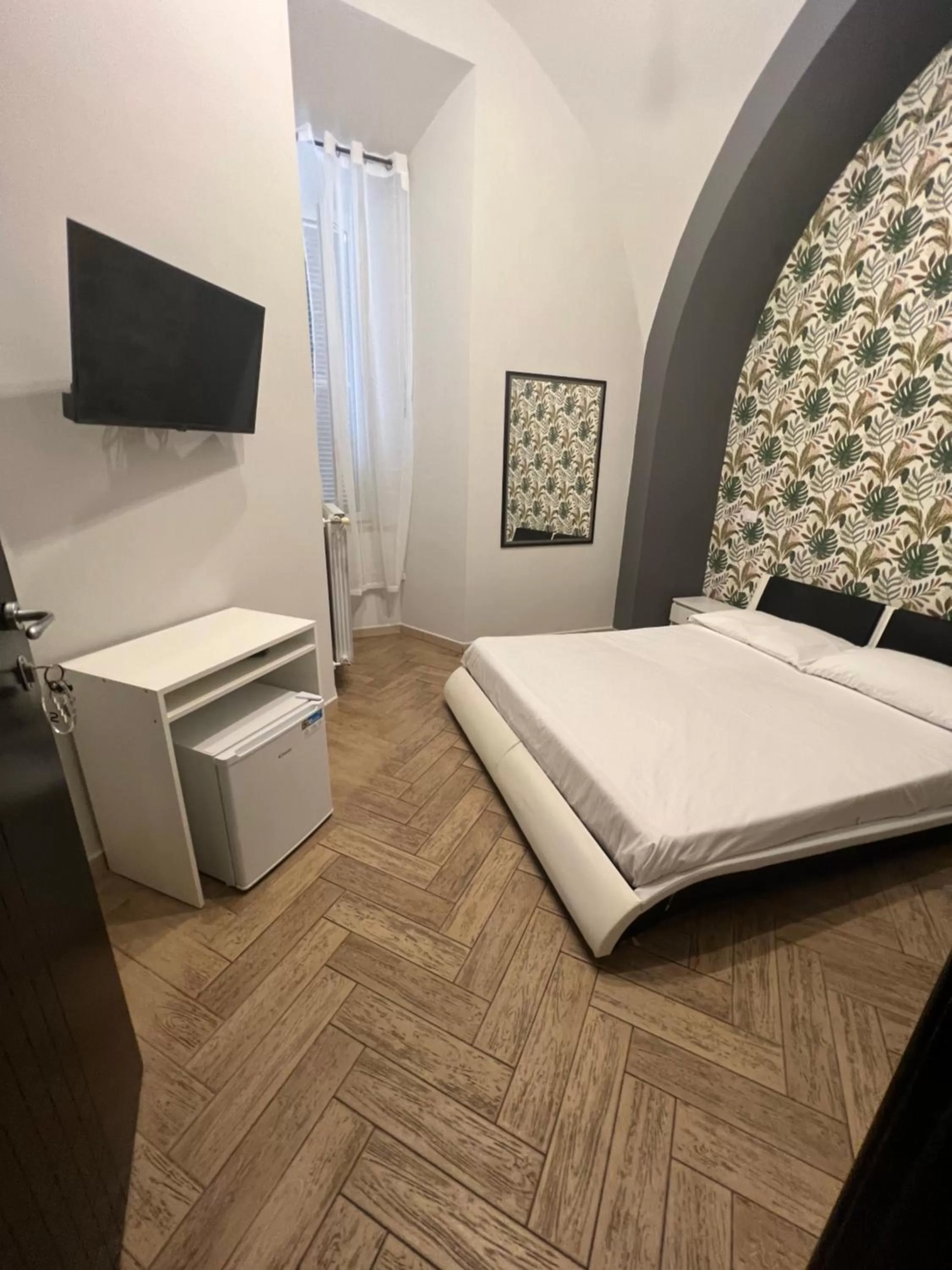 Bed in Palazzo Cardinale Rooms