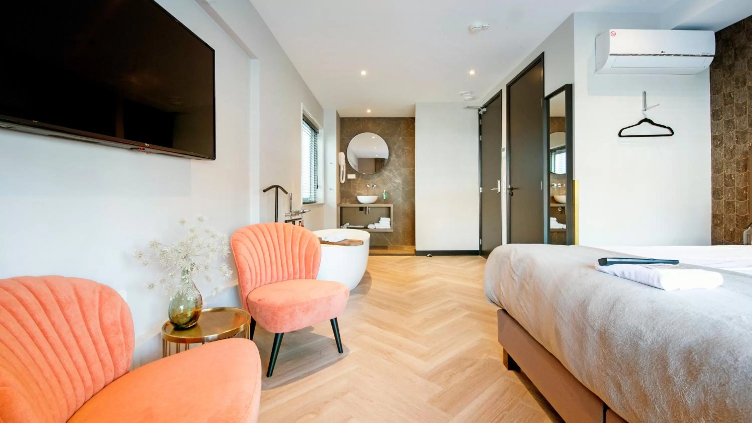 Bed in Harbour Suites Boutique Hotel