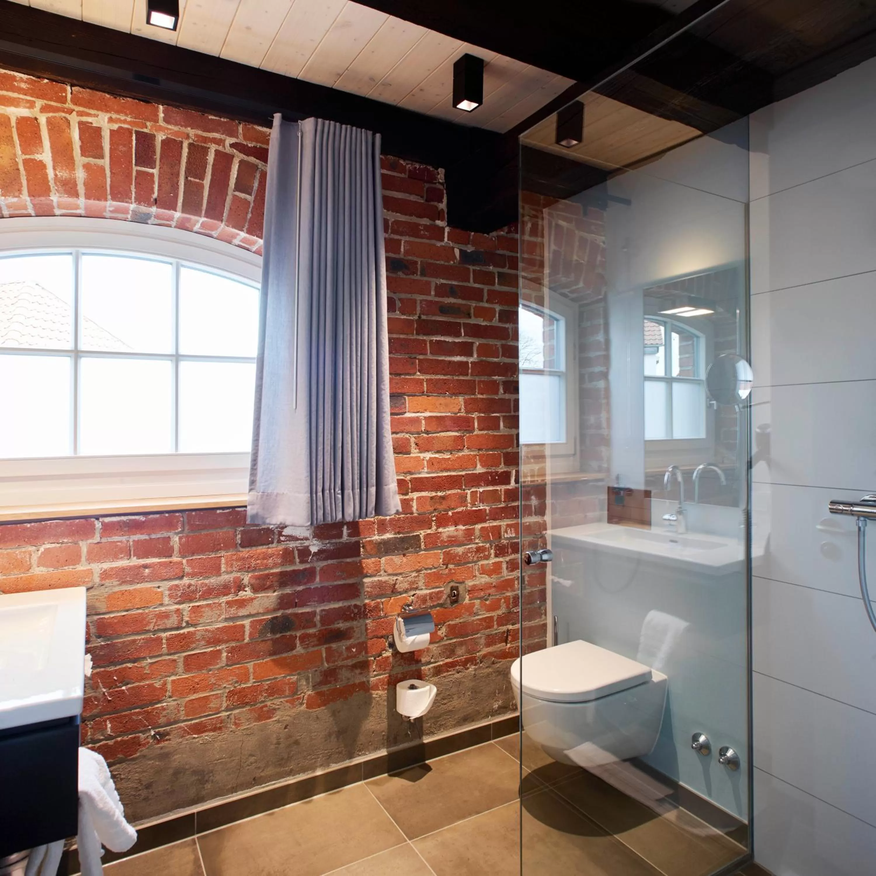 Bathroom in meinwolfsburg hotel auf dem rittergut vormals Yard Boarding Hotel