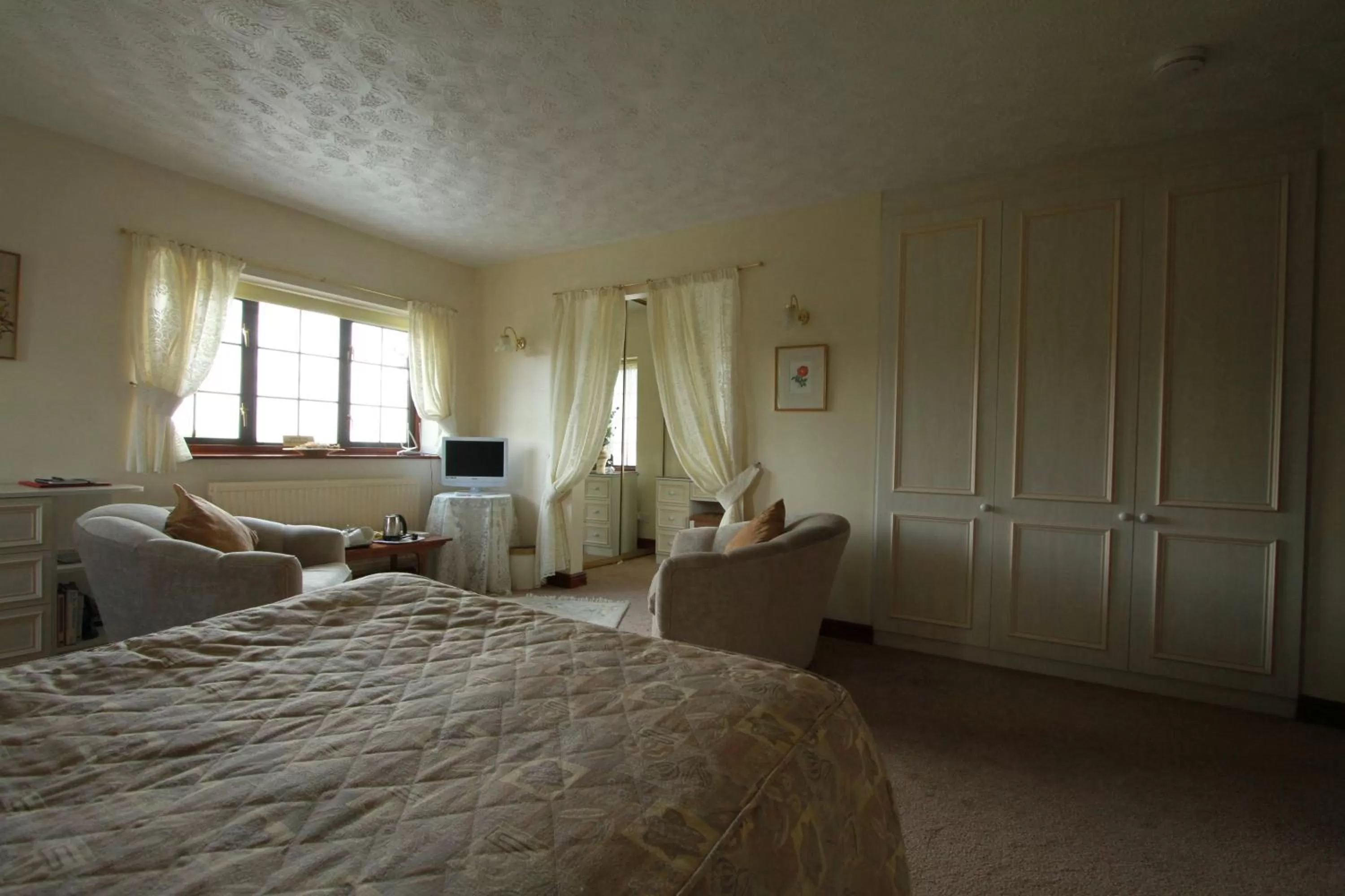 Bed in Pointers Guest House