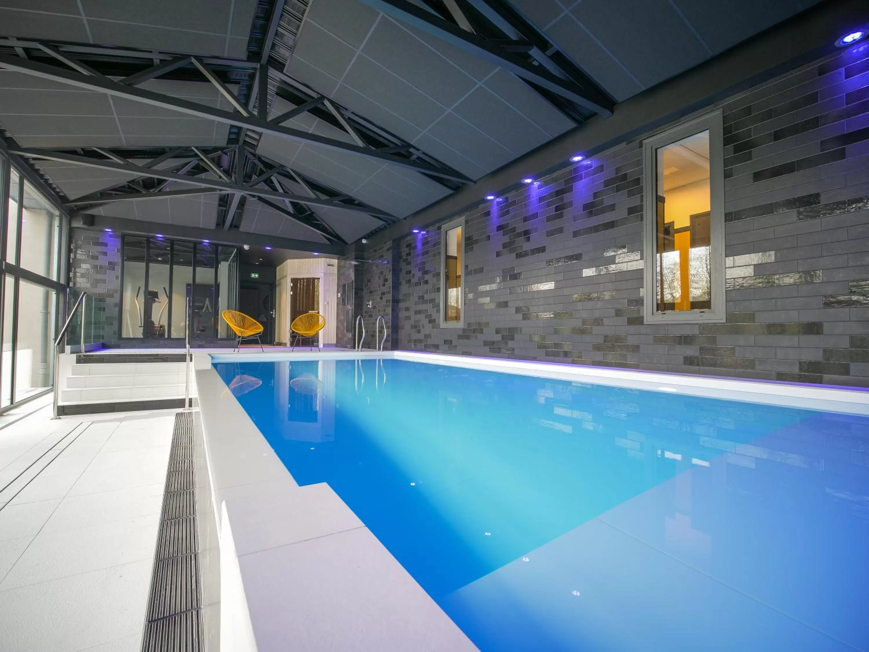 Swimming pool in Le Magic Hôtel & Spa