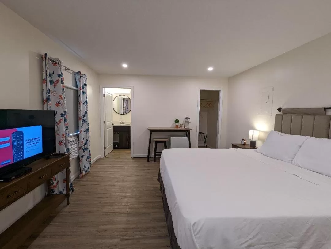 Bed in The Honey Bee Motel