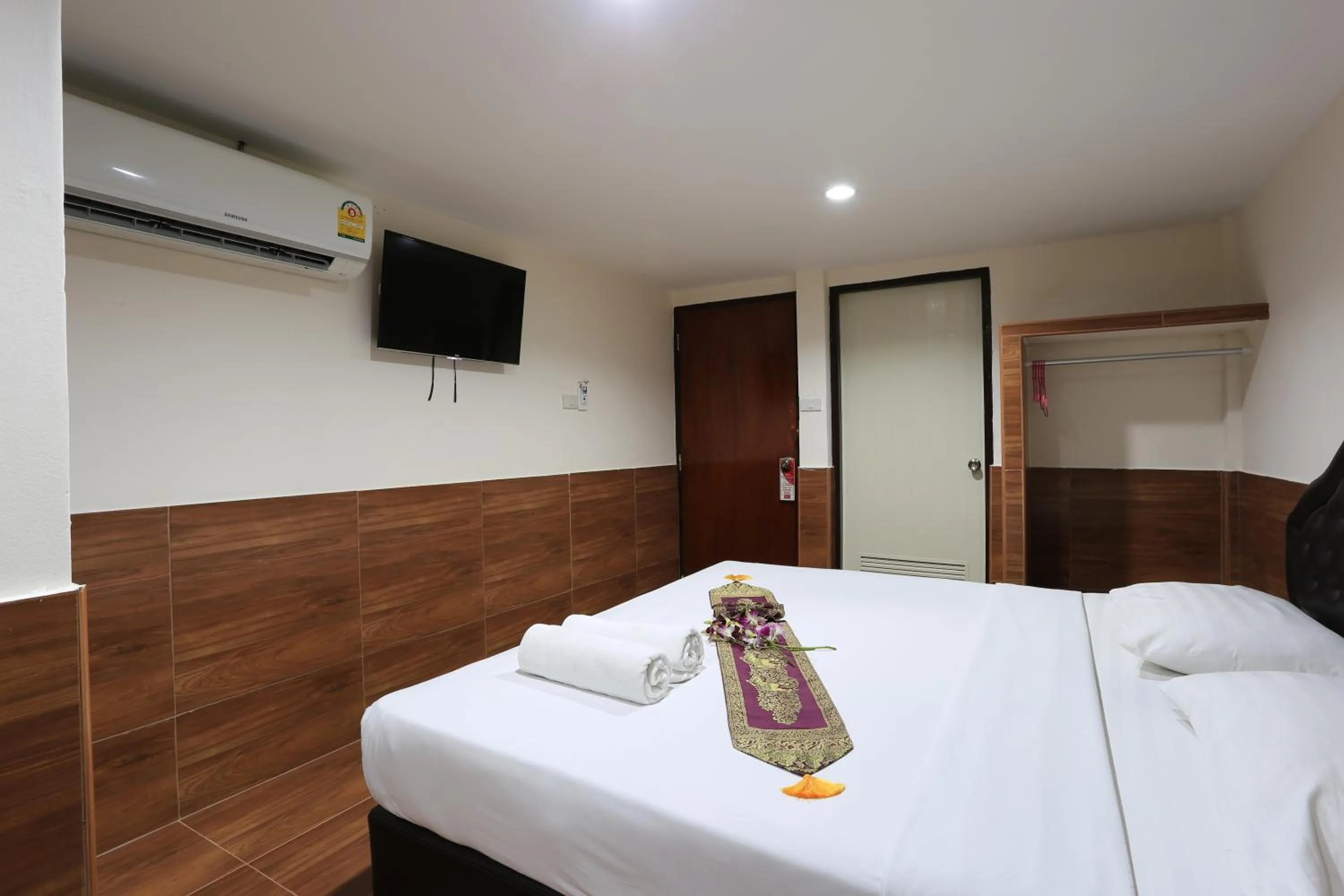 Bed in The Siam Guest House - SHA Extra Plus