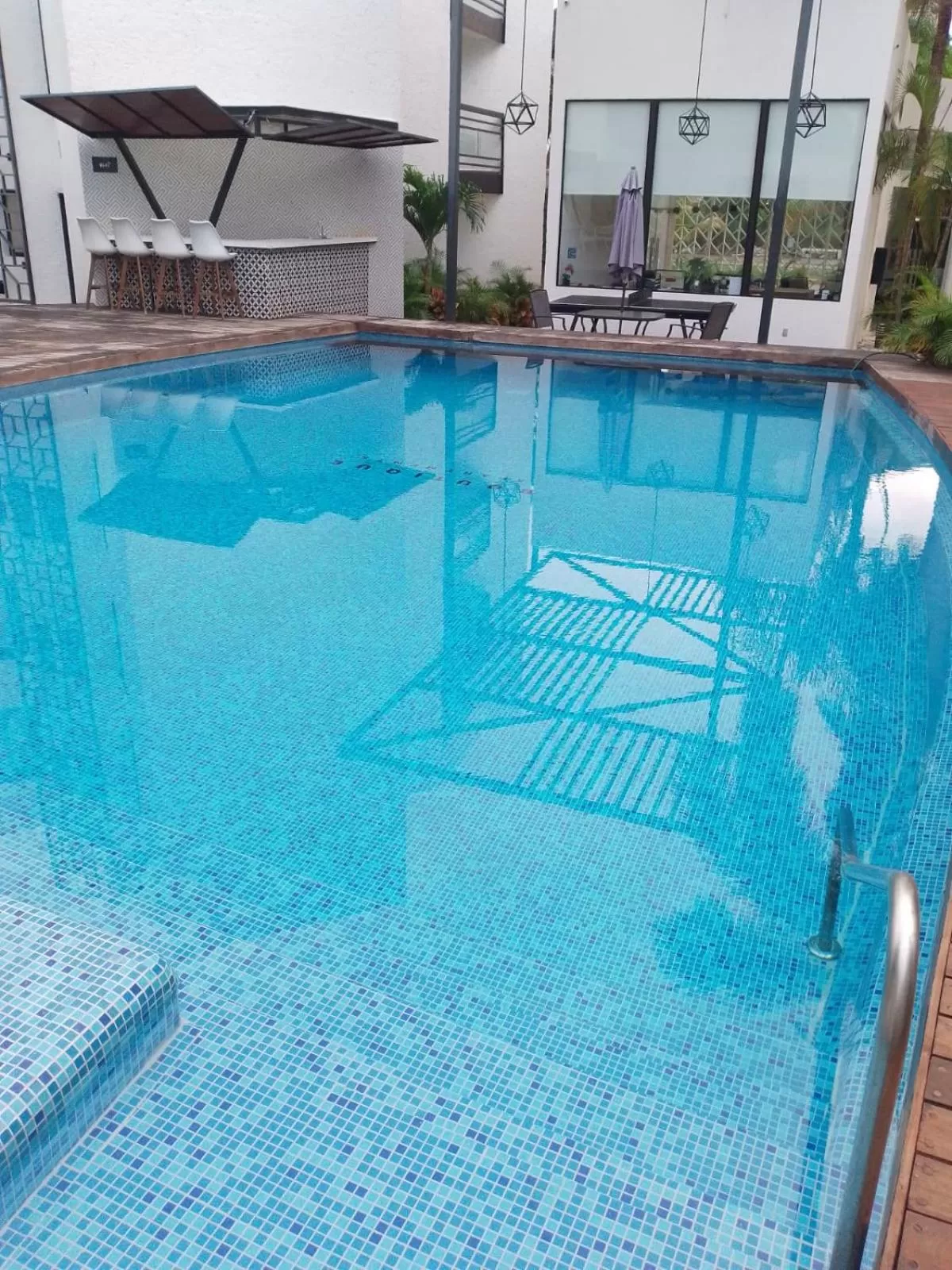 Swimming pool in Seven Boutique Apartments Cancún