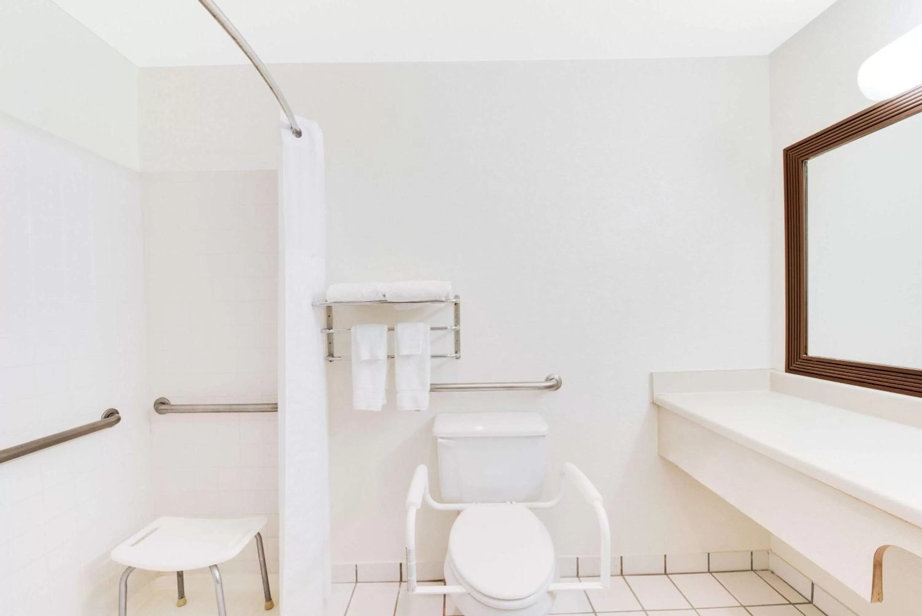 Bathroom in Baymont by Wyndham Midland Airport