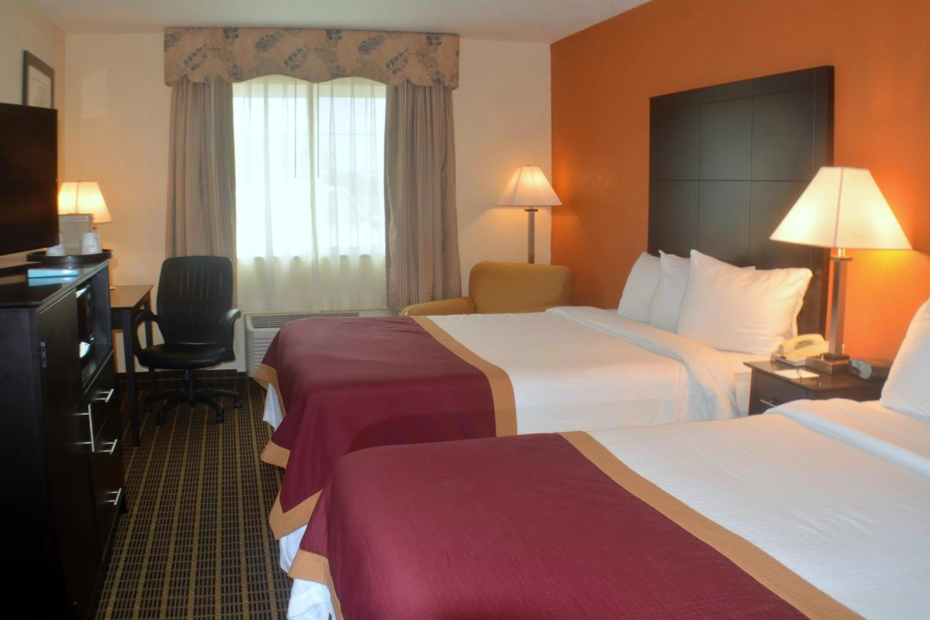 Bed in Baymont by Wyndham Muskegon