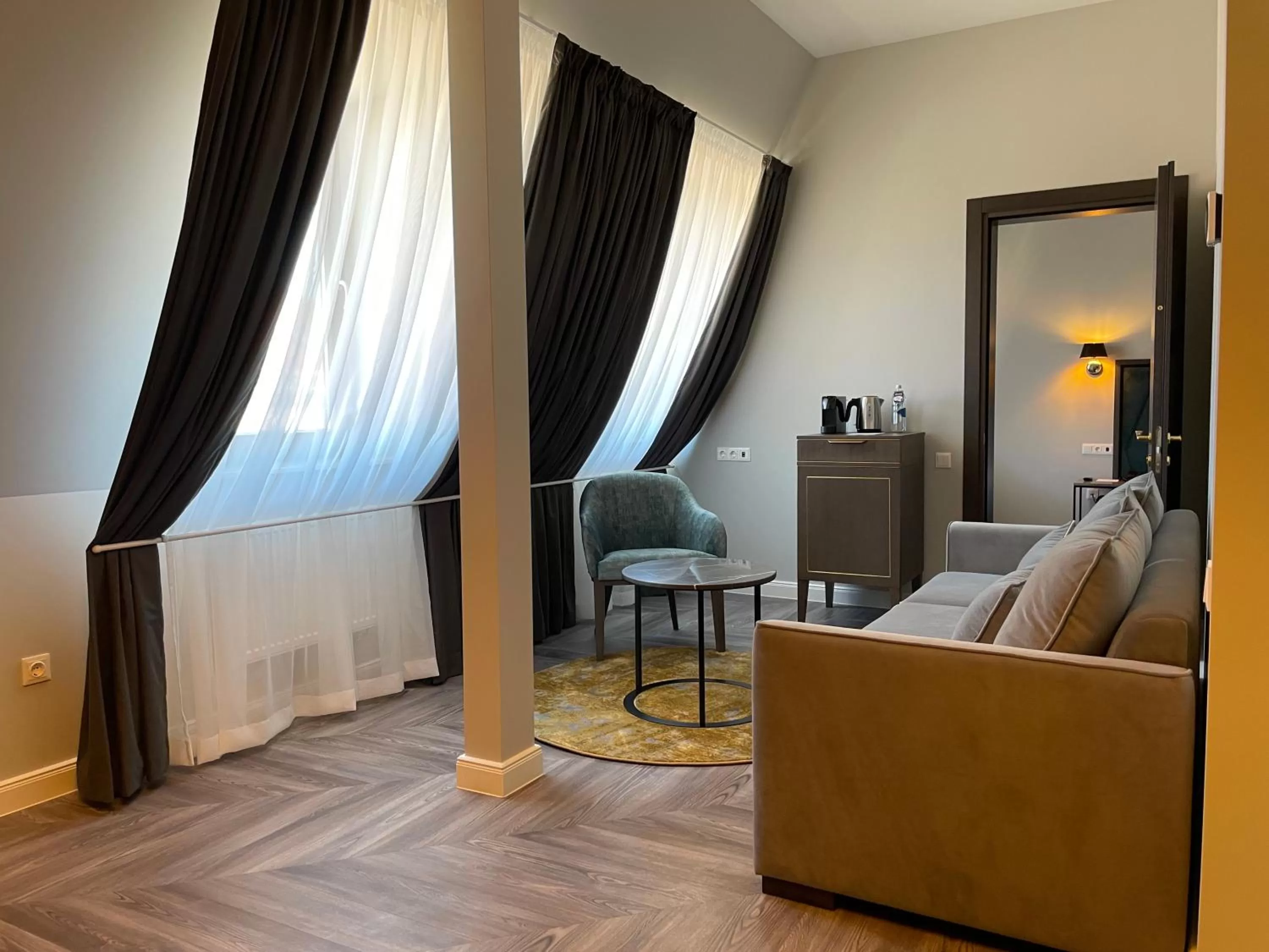 Communal lounge/ TV room in VICTORIA Hotel Klaipėda