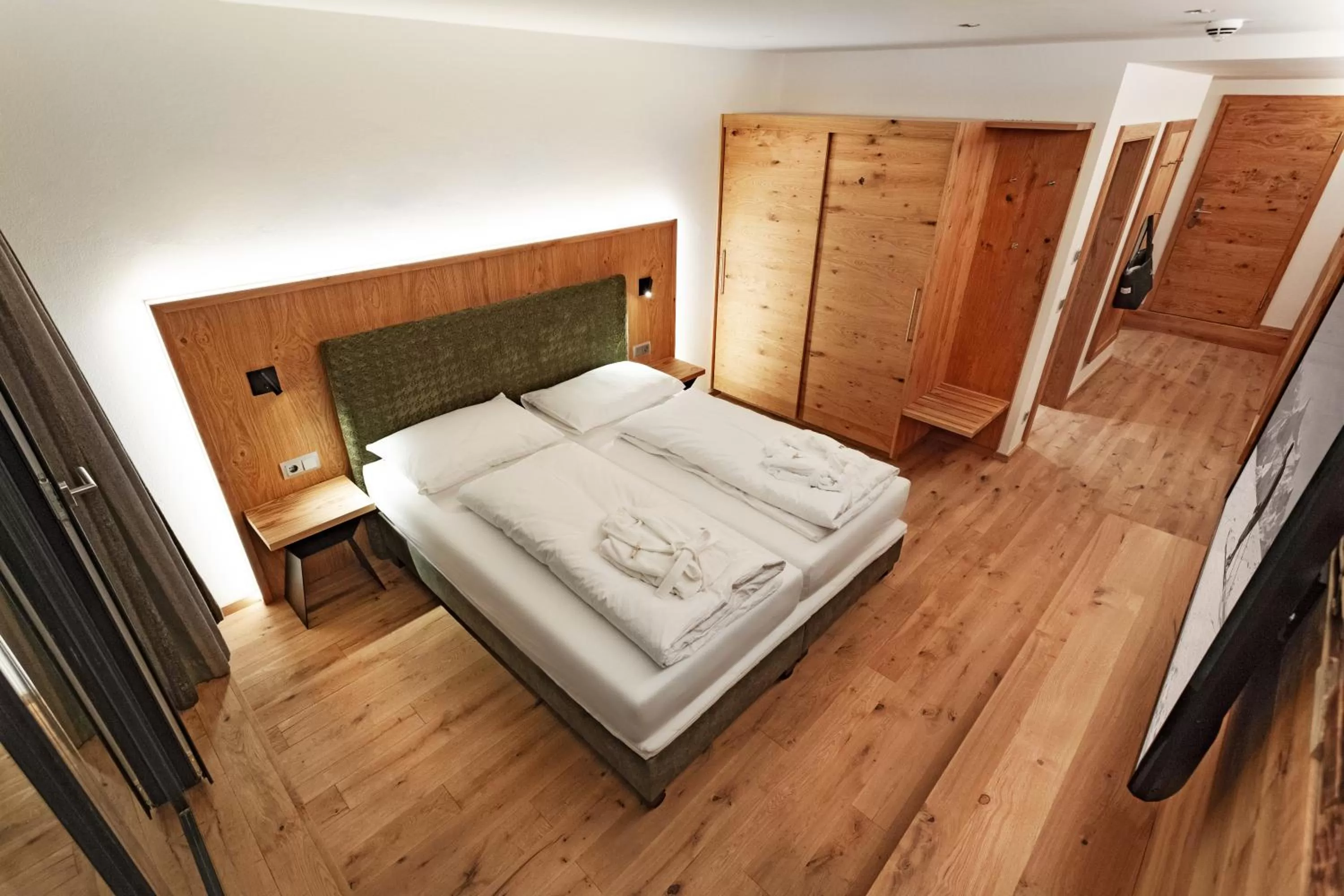 Photo of the whole room, Bed in Berghotel Schmittenhöhe