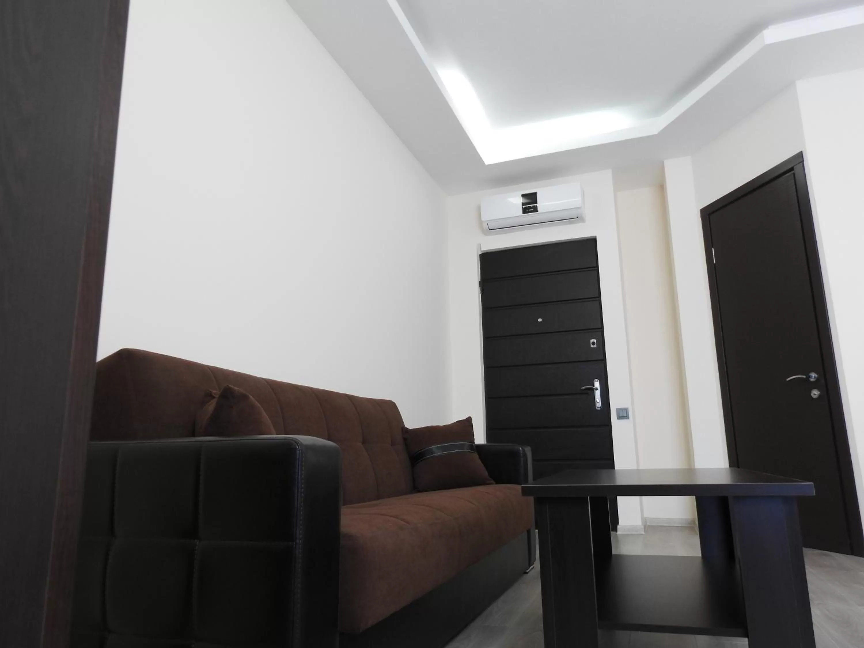 Seating area in Iko's Family Apartments